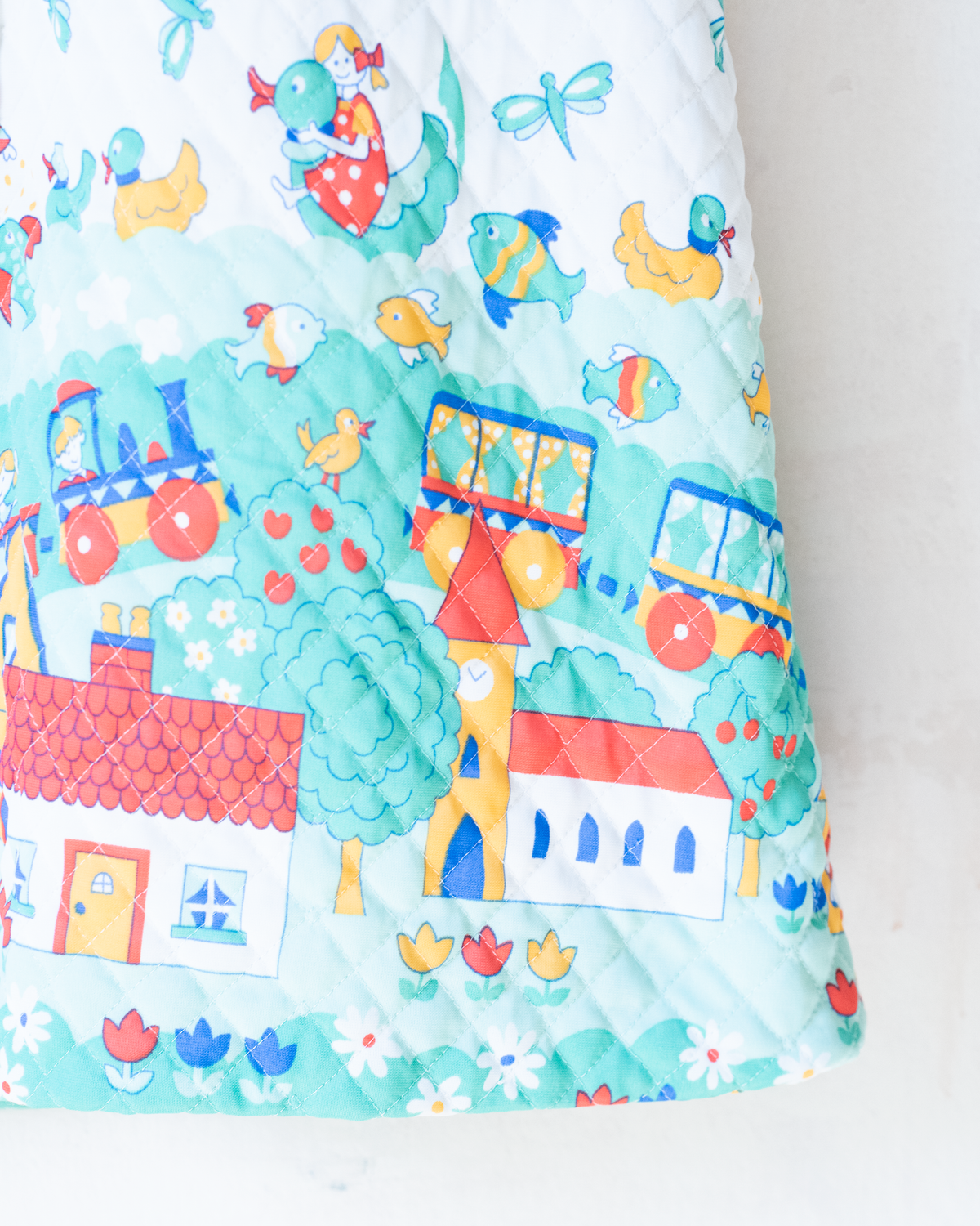 Synthetic jacket with nostalgic prints | 7-8 years