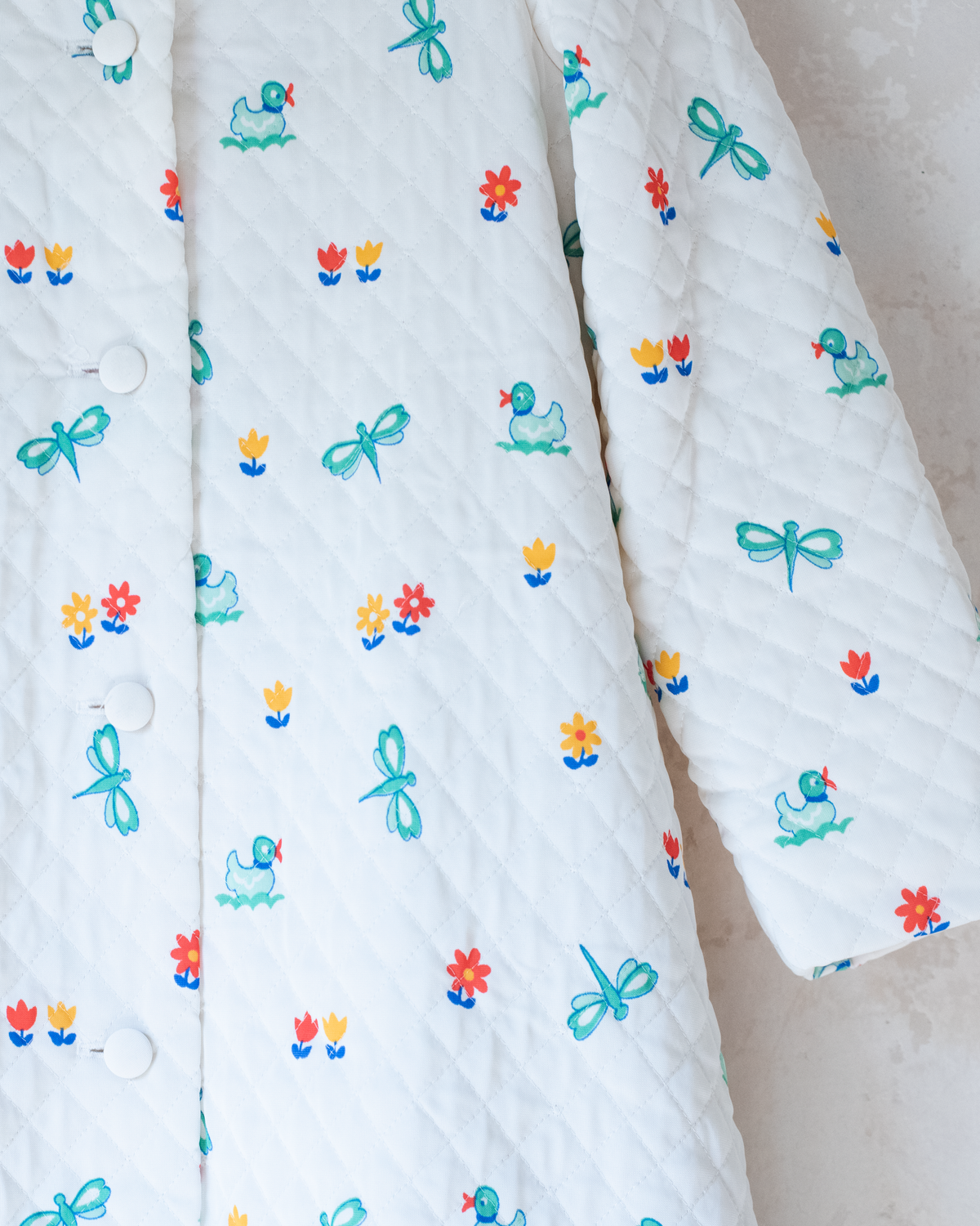 Synthetic jacket with nostalgic prints | 7-8 years