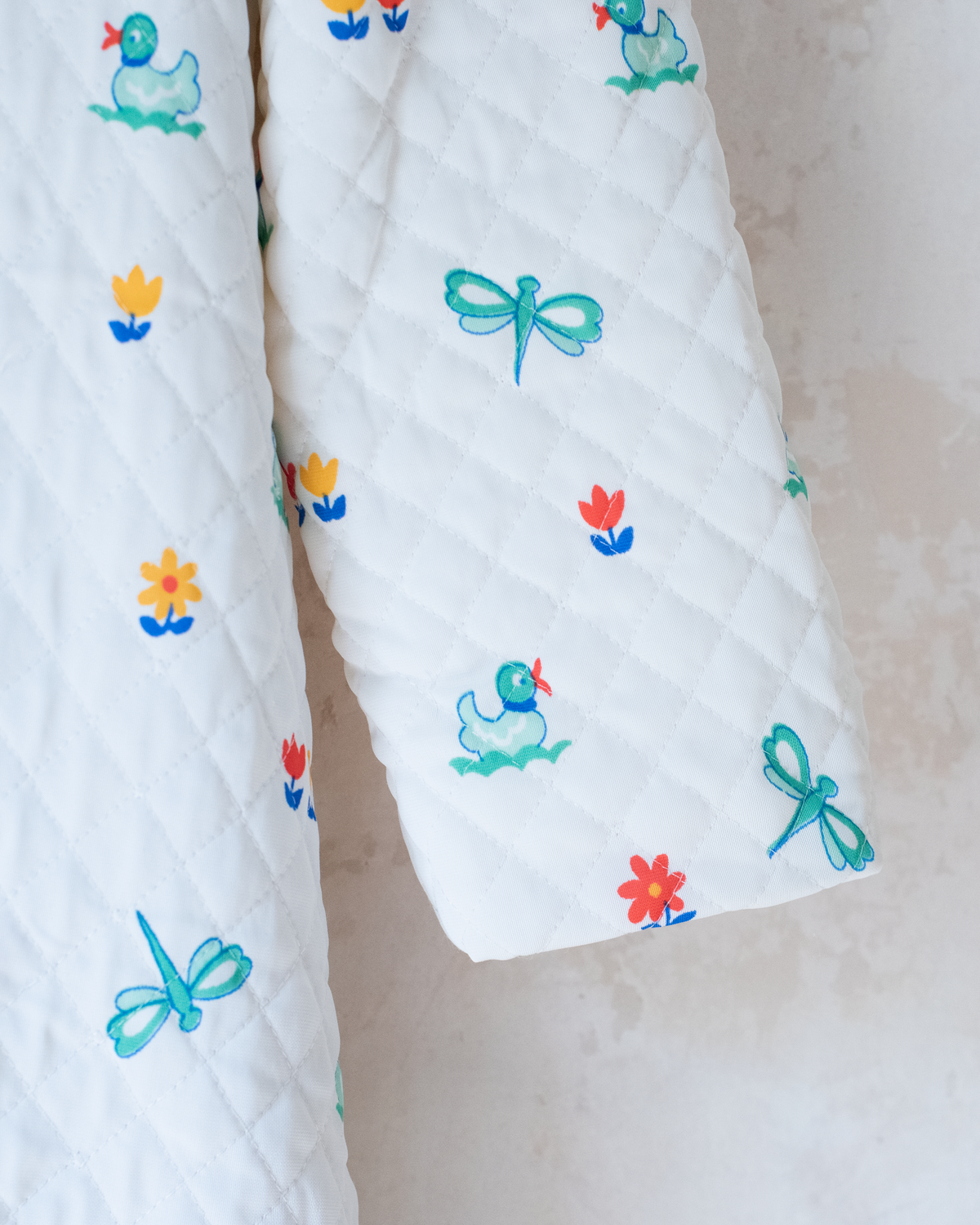 Synthetic jacket with nostalgic prints | 7-8 years