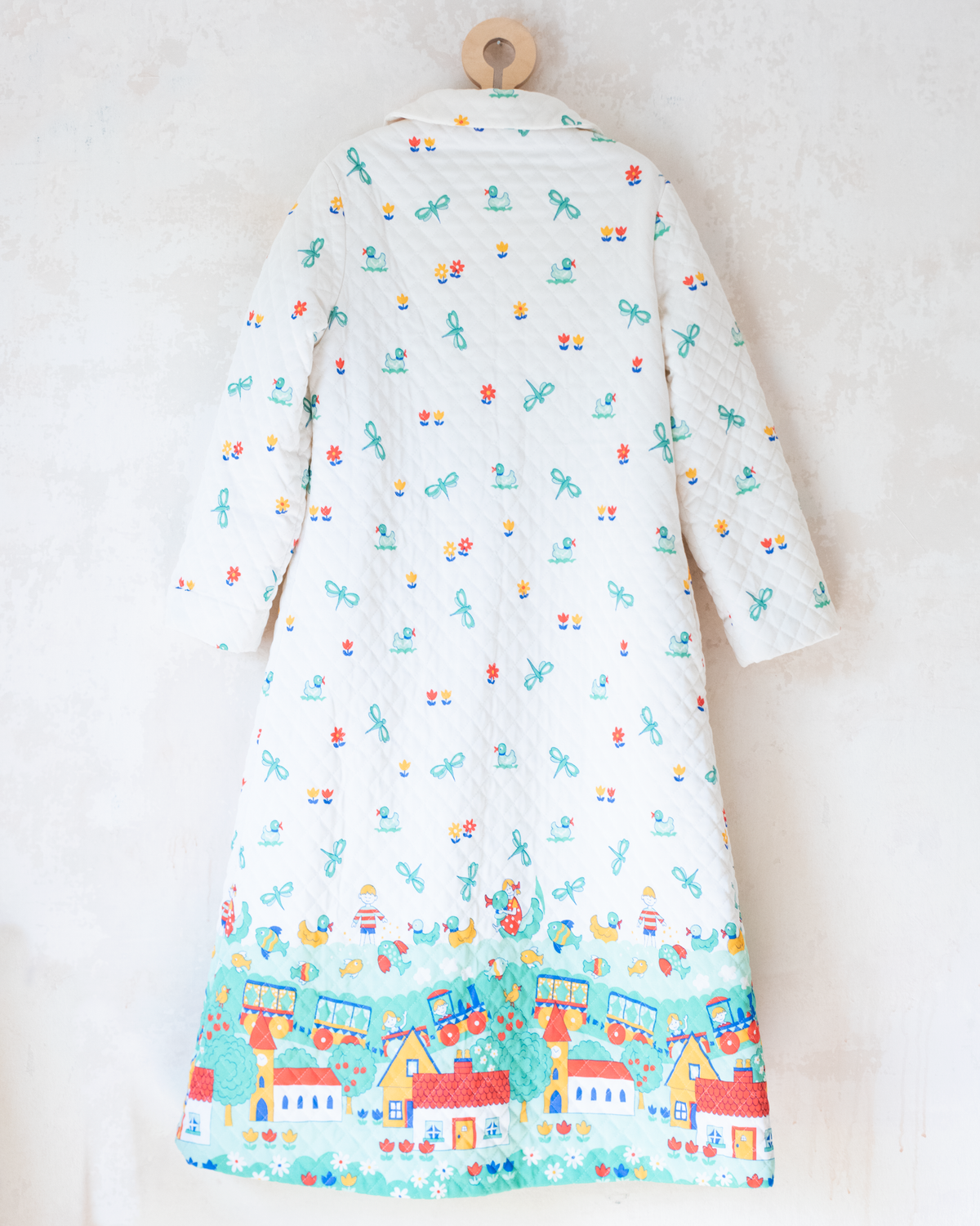 Synthetic jacket with nostalgic prints | 7-8 years