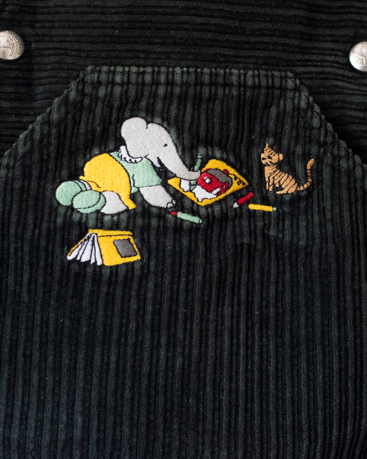 Green corduroy sarafan with colorful embroidery of the King in the Bar | 18-24 months