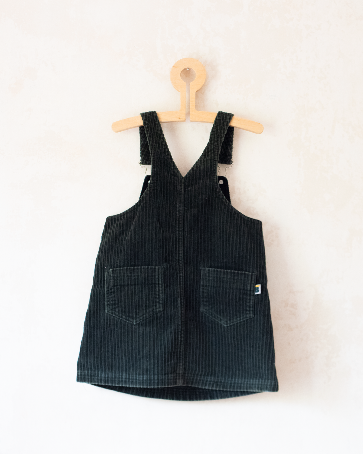 Green corduroy sarafan with colorful embroidery of the King in the Bar | 18-24 months