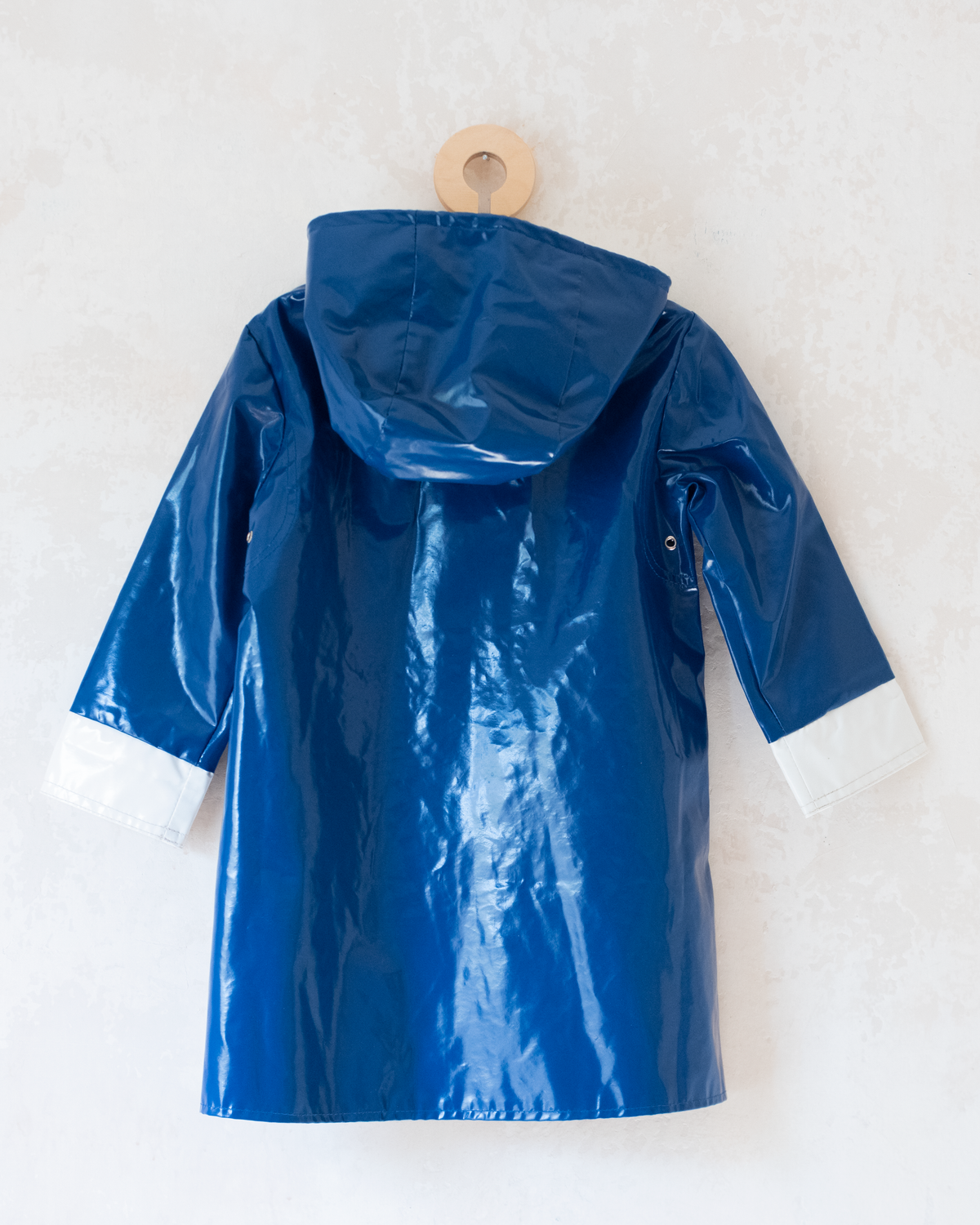 Blue raincoat with anchor buttons | 4-5 years