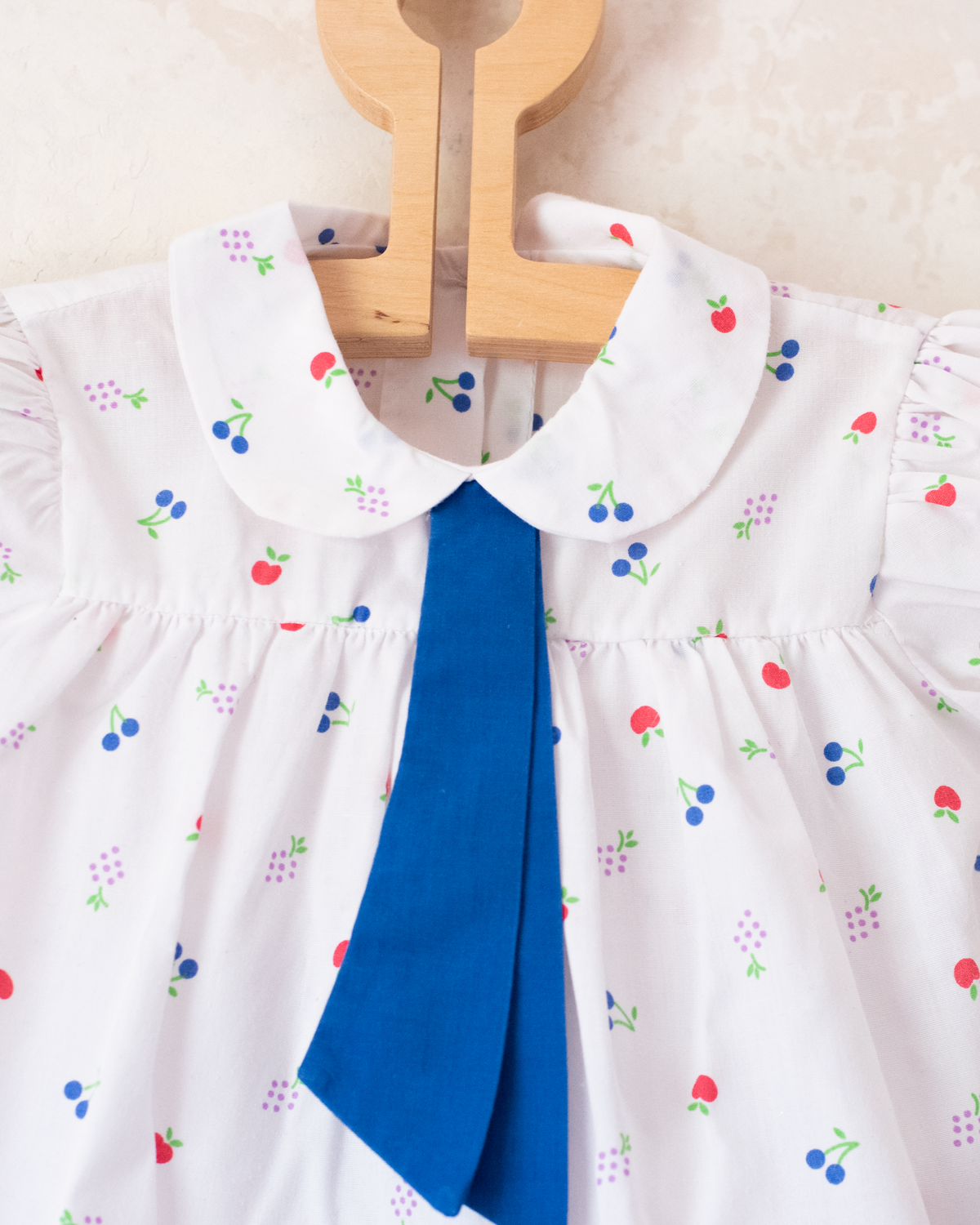 Set with colorful fruits and blue ribbons | 12-18 months