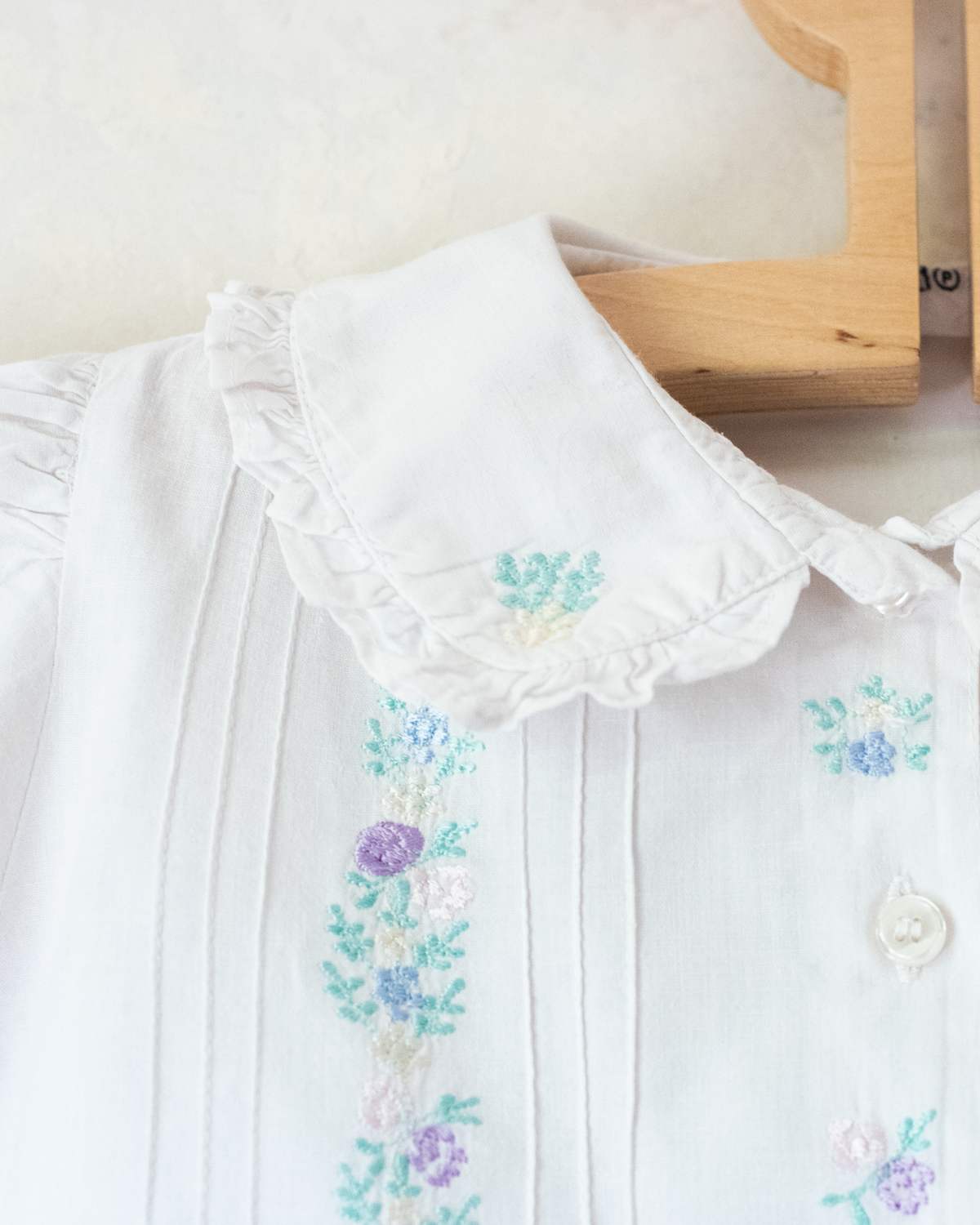 White shirt with pastel floral embroidery | 6-7 years