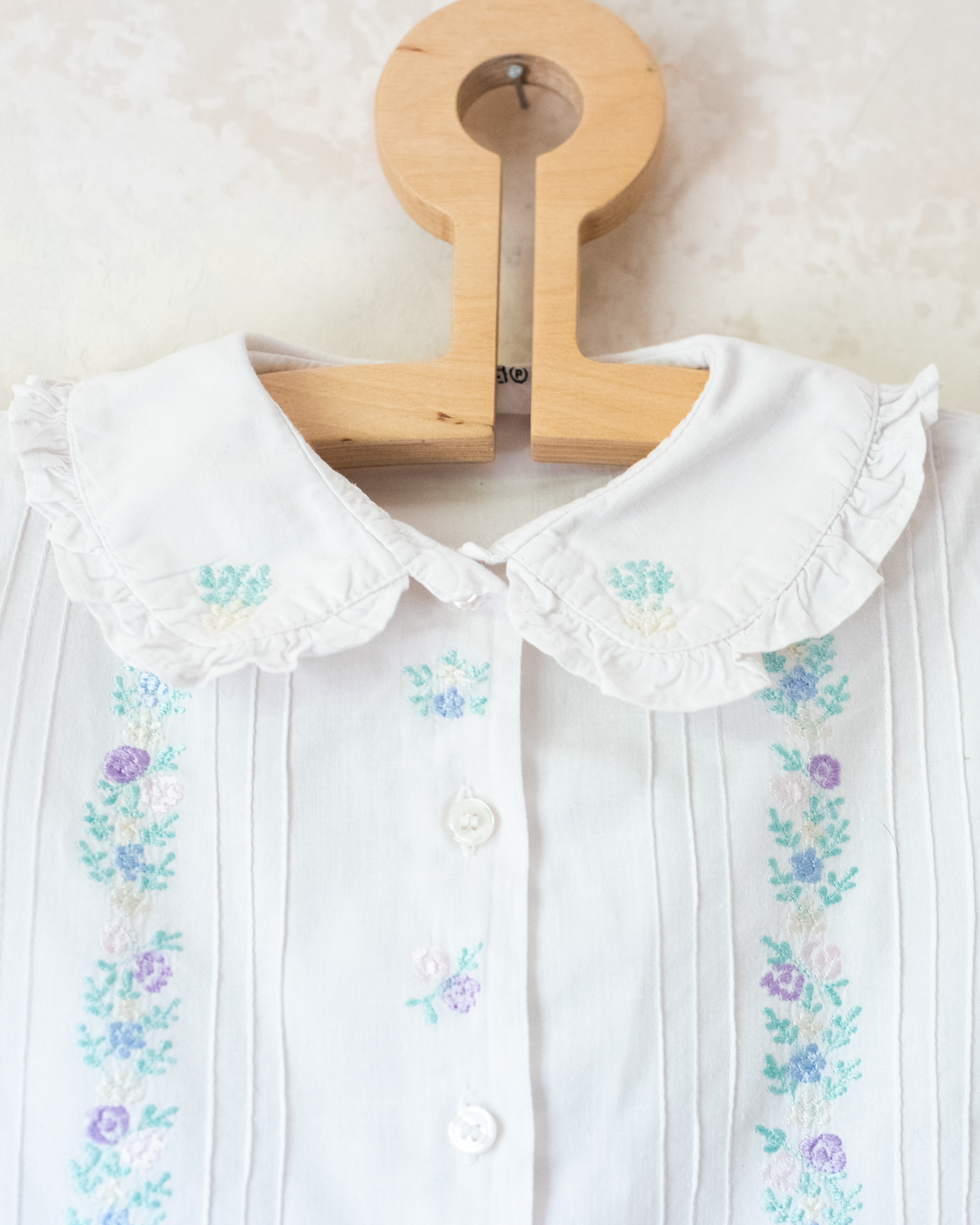 White shirt with pastel floral embroidery | 6-7 years