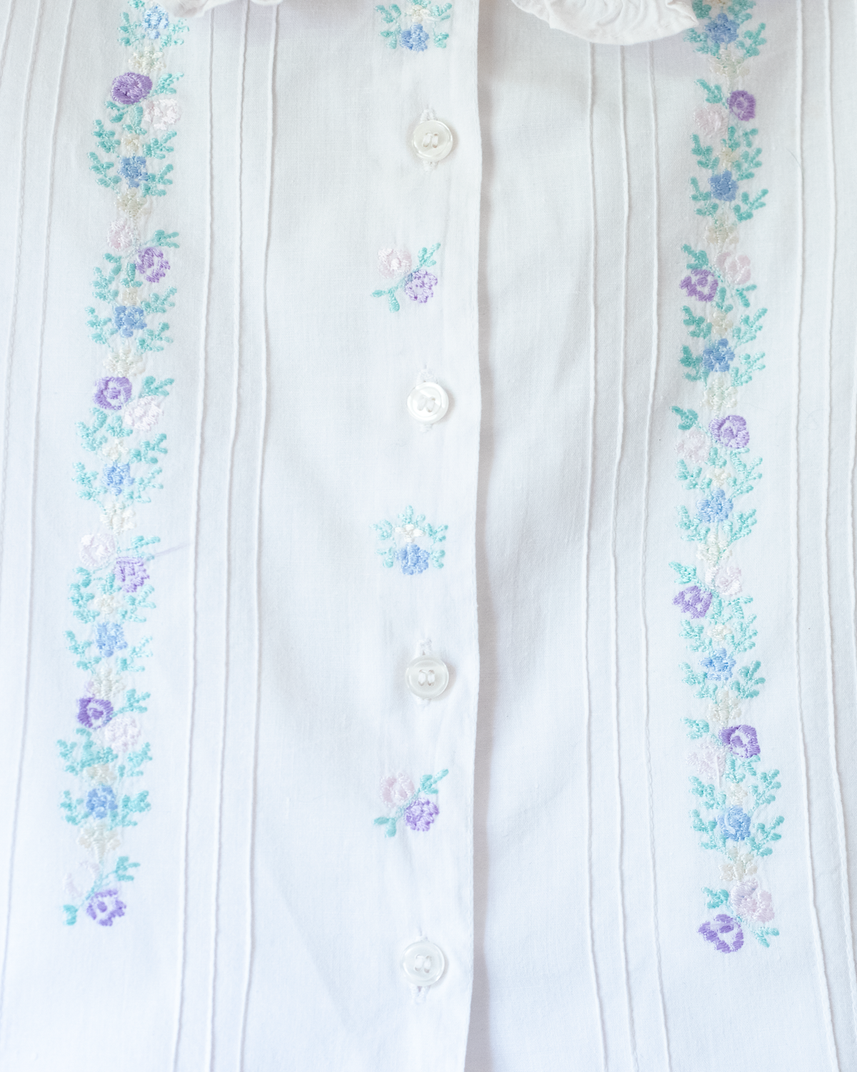 White shirt with pastel floral embroidery | 6-7 years