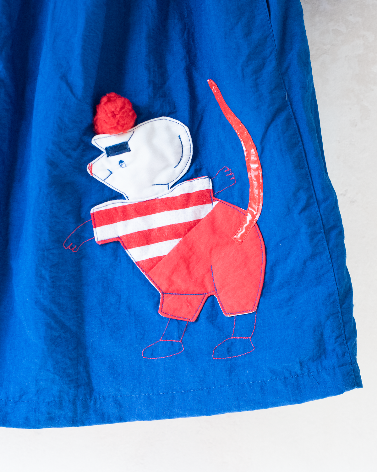 Blue coat with embroidered mouse from Yves Saint Laurent | 7-8 years
