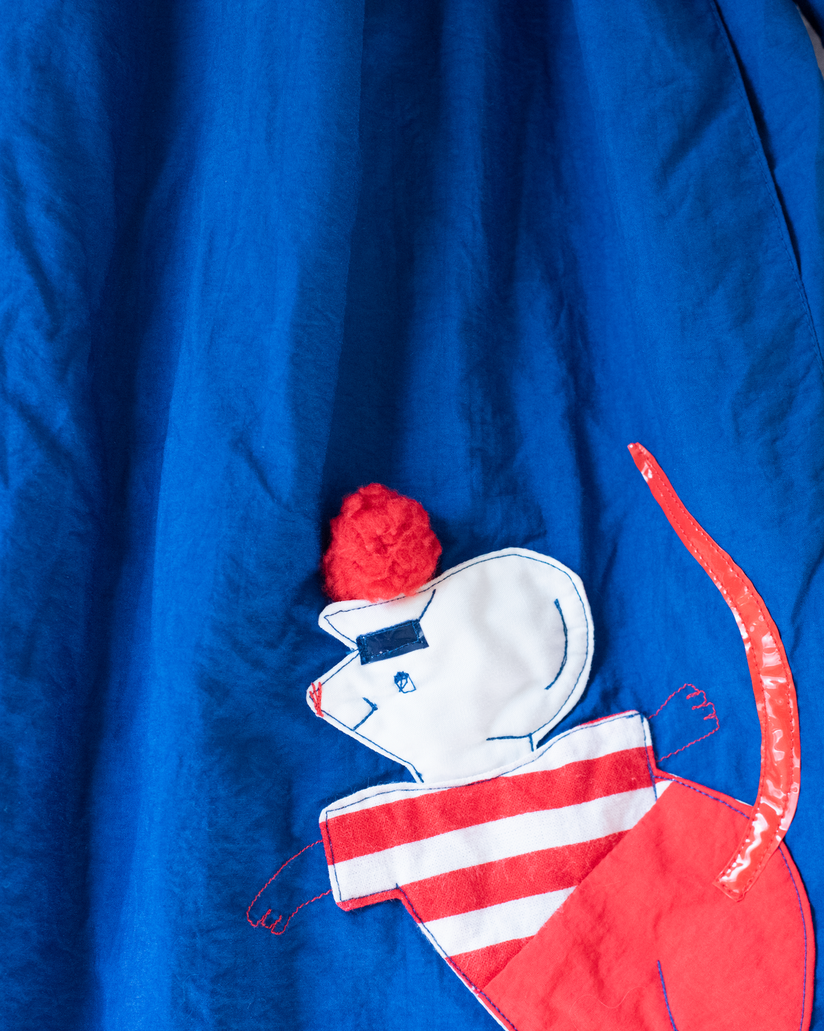 Blue coat with embroidered mouse from Yves Saint Laurent | 7-8 years