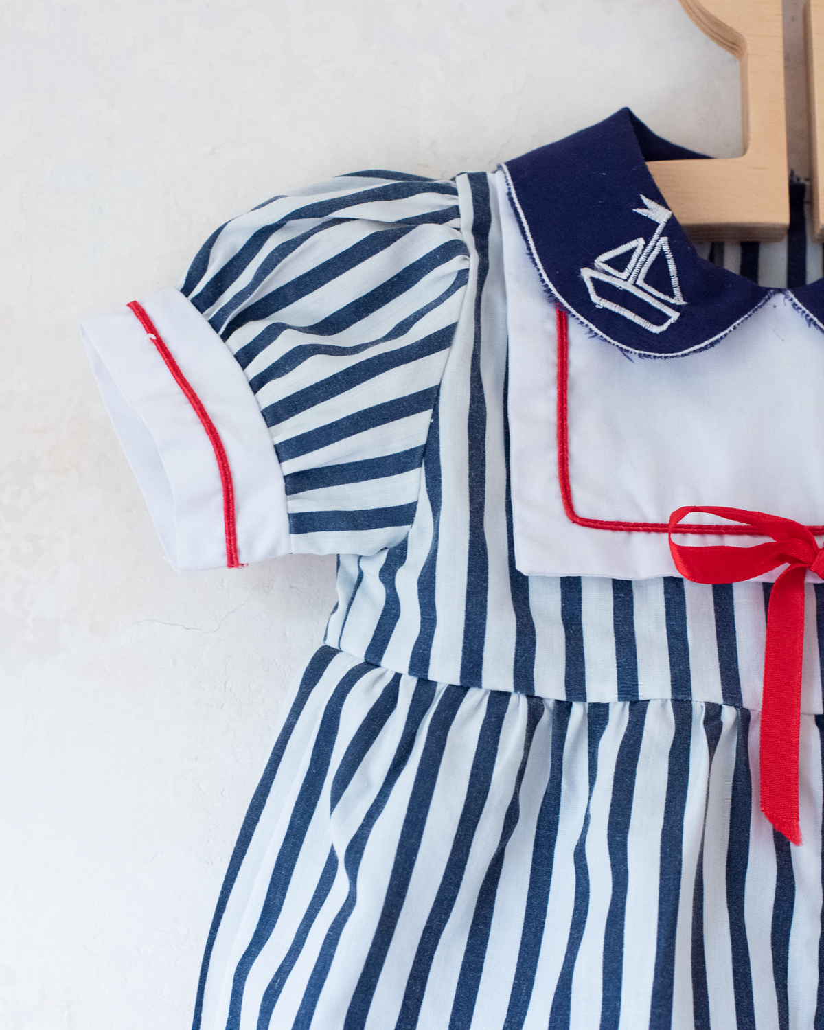Striped overalls with embroidered boat collar | 6-9 months