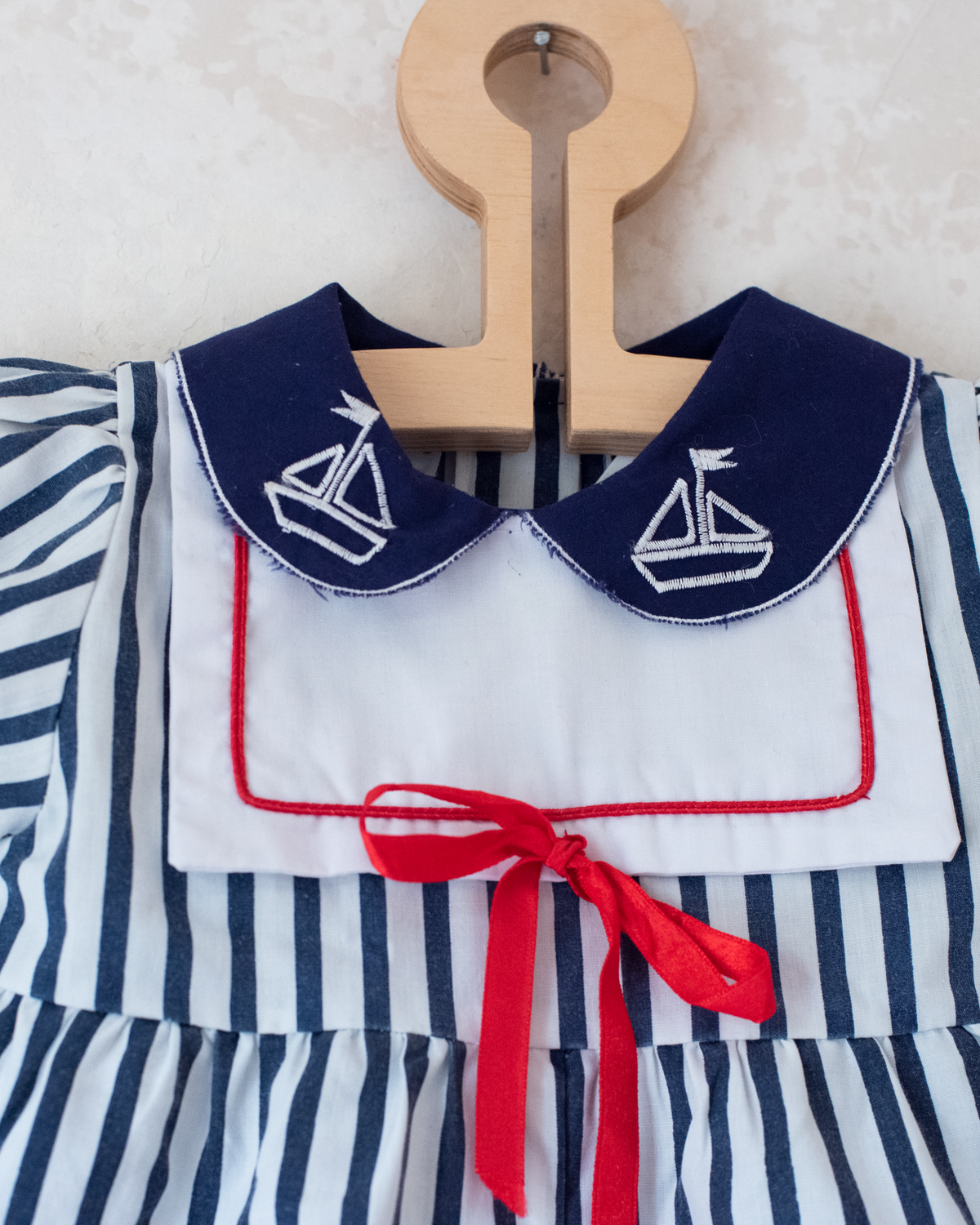 Striped overalls with embroidered boat collar | 6-9 months