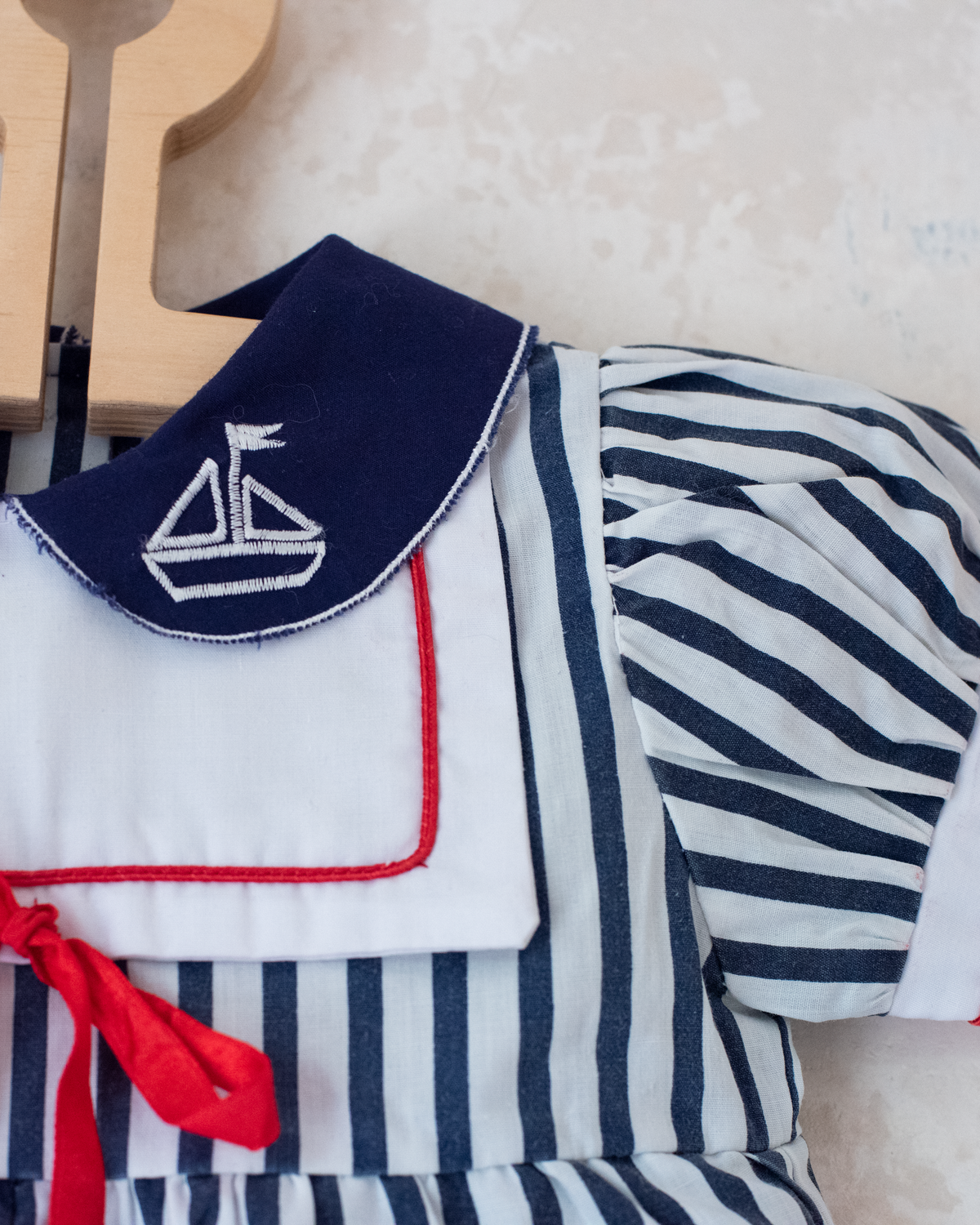 Striped overalls with embroidered boat collar | 6-9 months