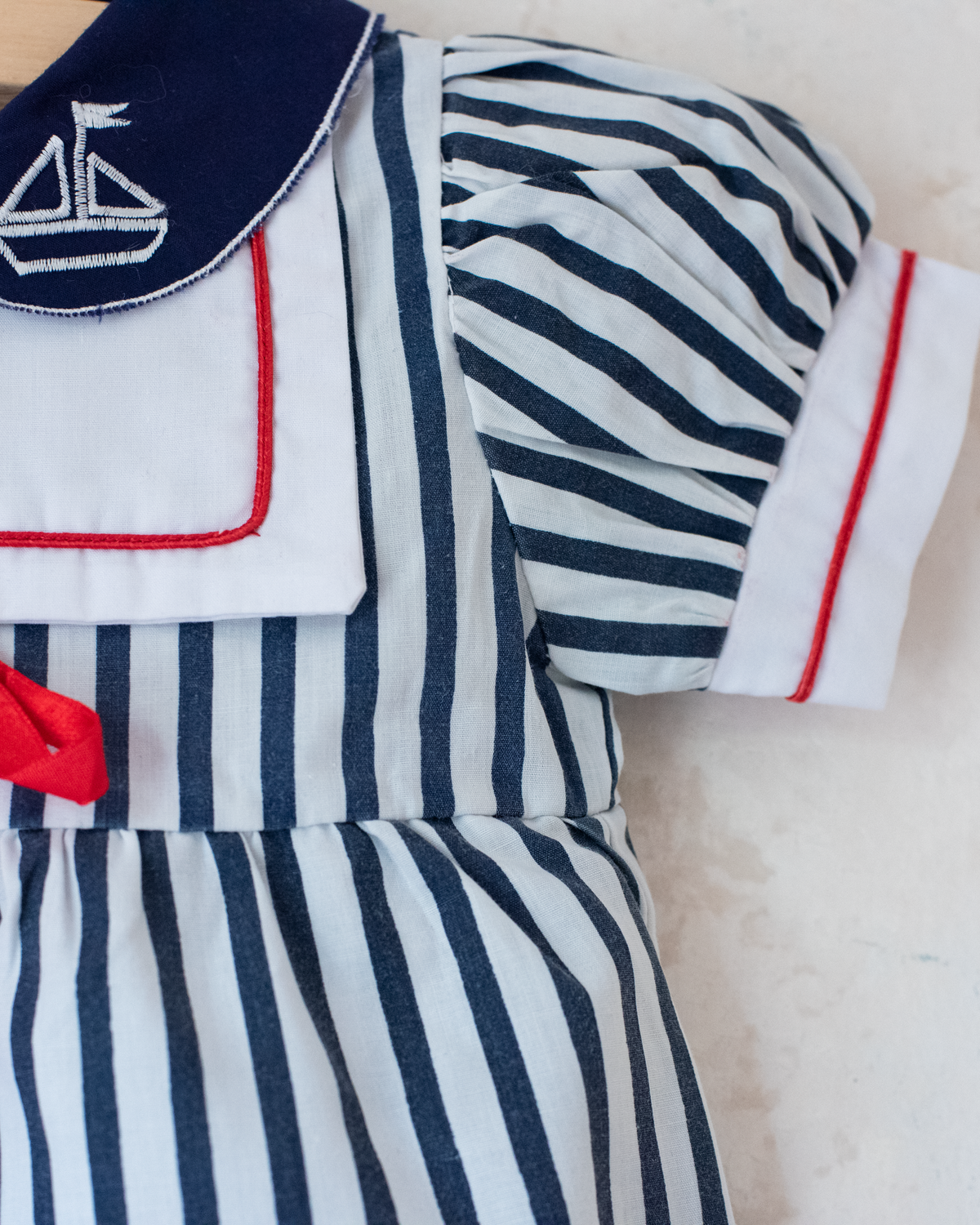 Striped overalls with embroidered boat collar | 6-9 months