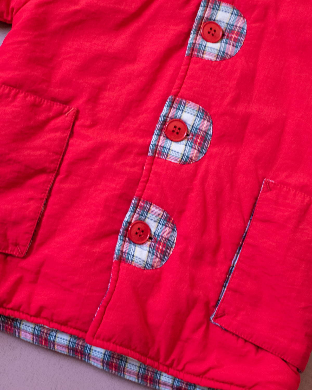 Red down jacket with checks from Yves Saint Laurent | 3-9 months
