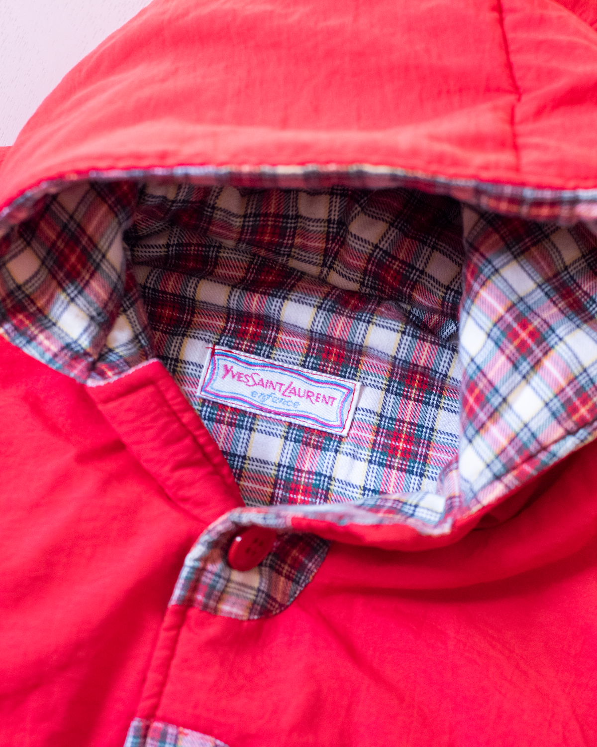 Red down jacket with checks from Yves Saint Laurent | 3-9 months