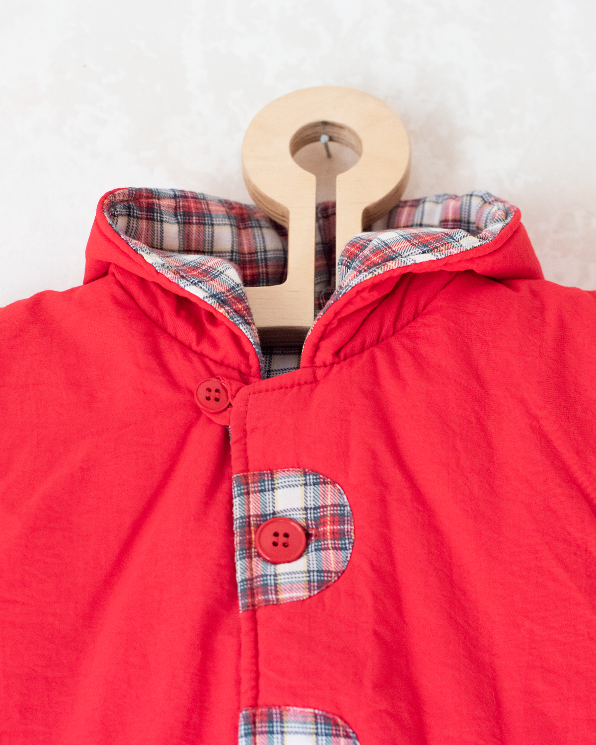 Red down jacket with checks from Yves Saint Laurent | 3-9 months