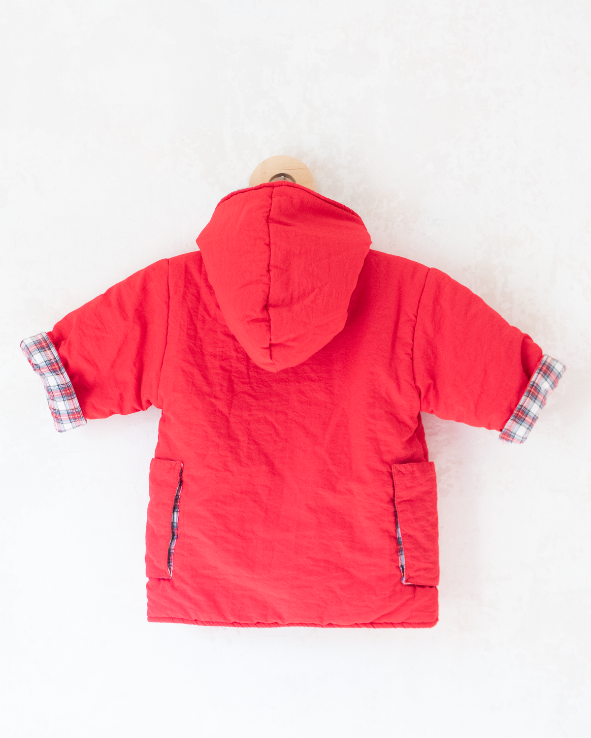 Red down jacket with checks from Yves Saint Laurent | 3-9 months