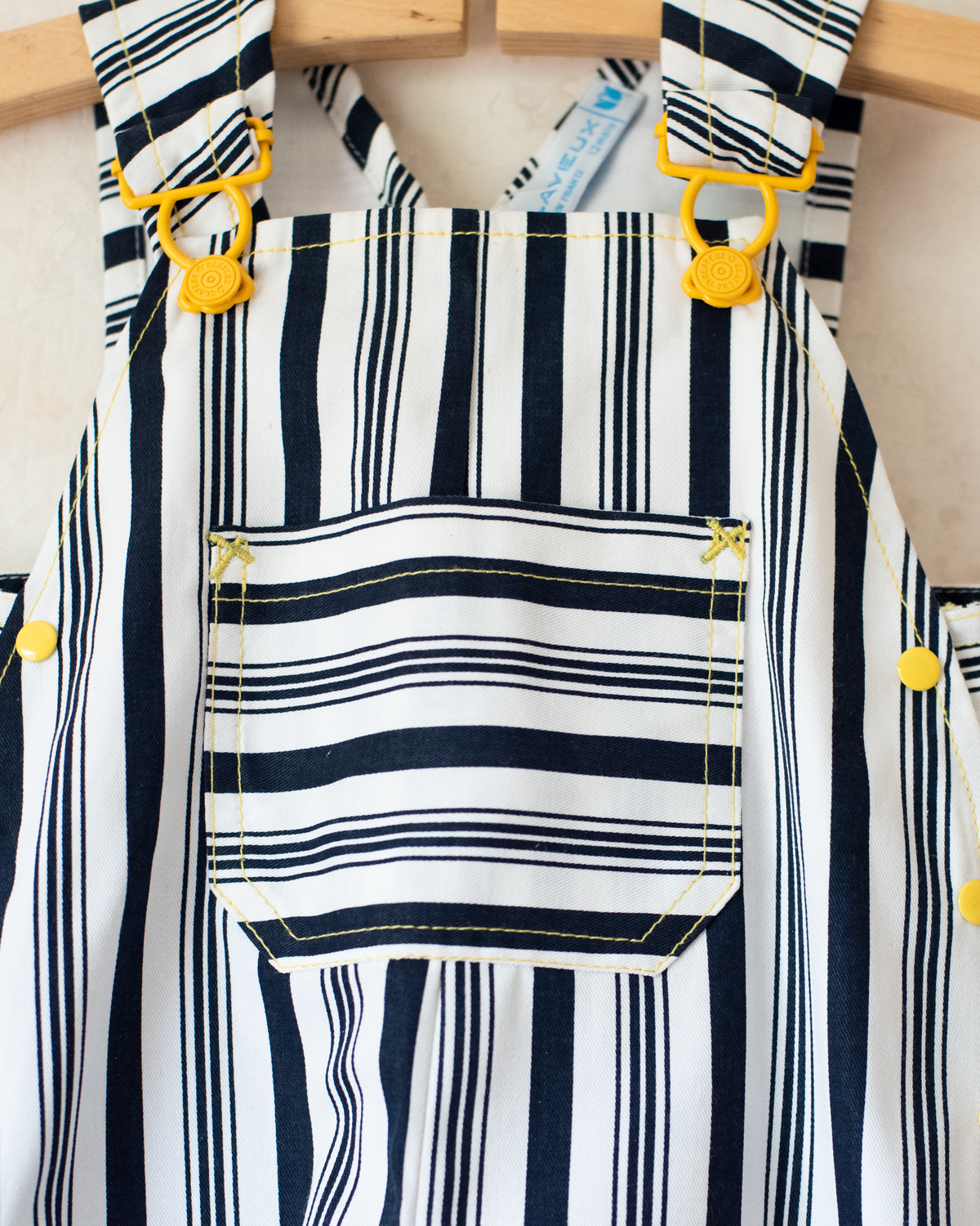 Striped overalls with yellow buttons | 12-18 months