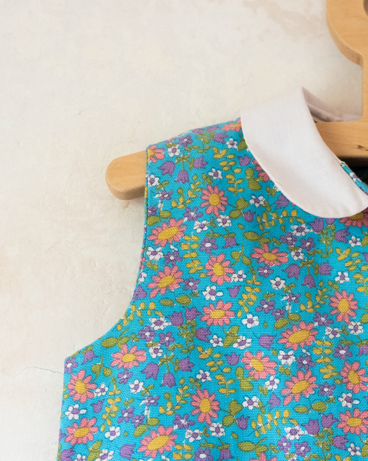 Sky-blue dress with flowers from the seventies | 18-24 months