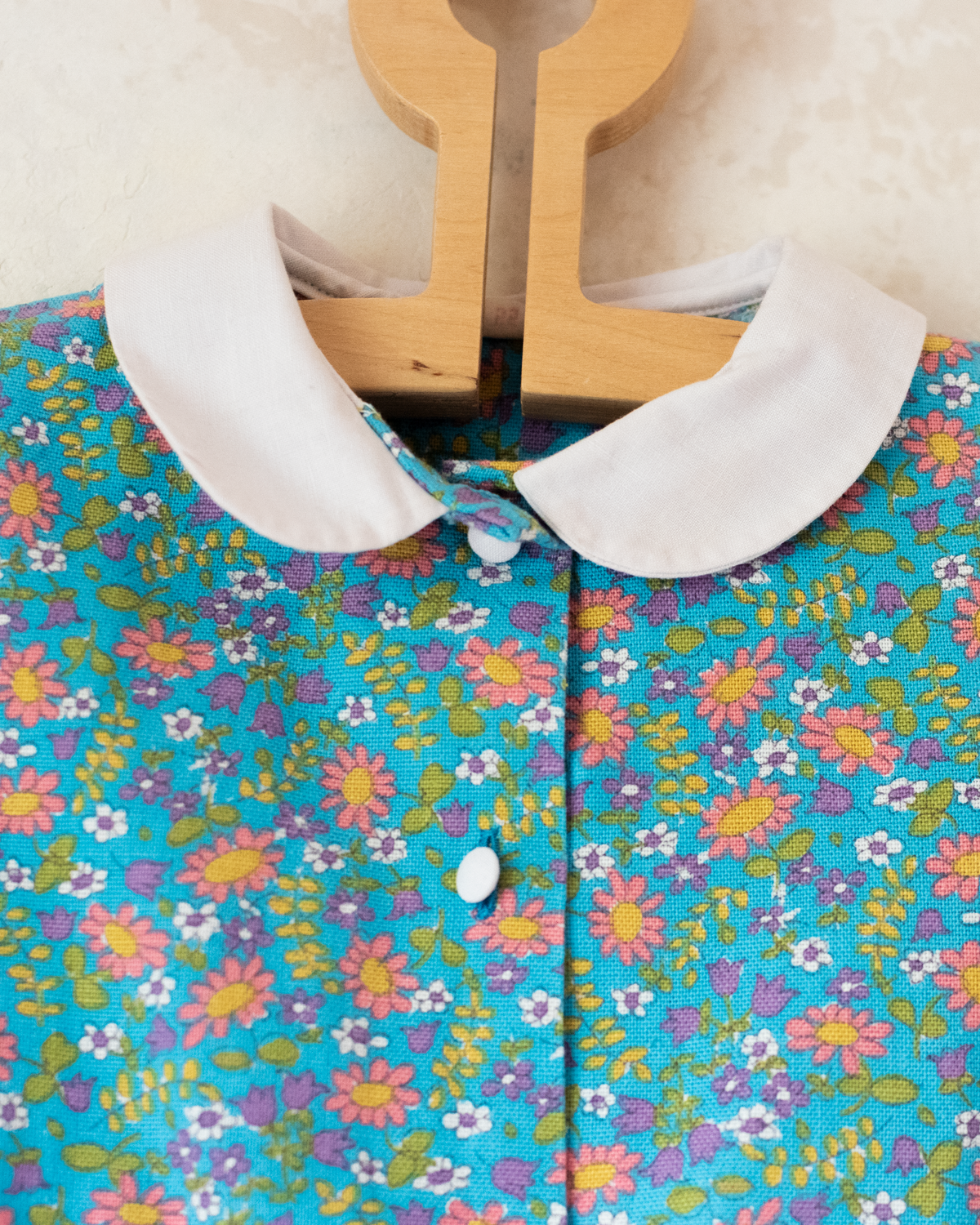 Sky-blue dress with flowers from the seventies | 18-24 months