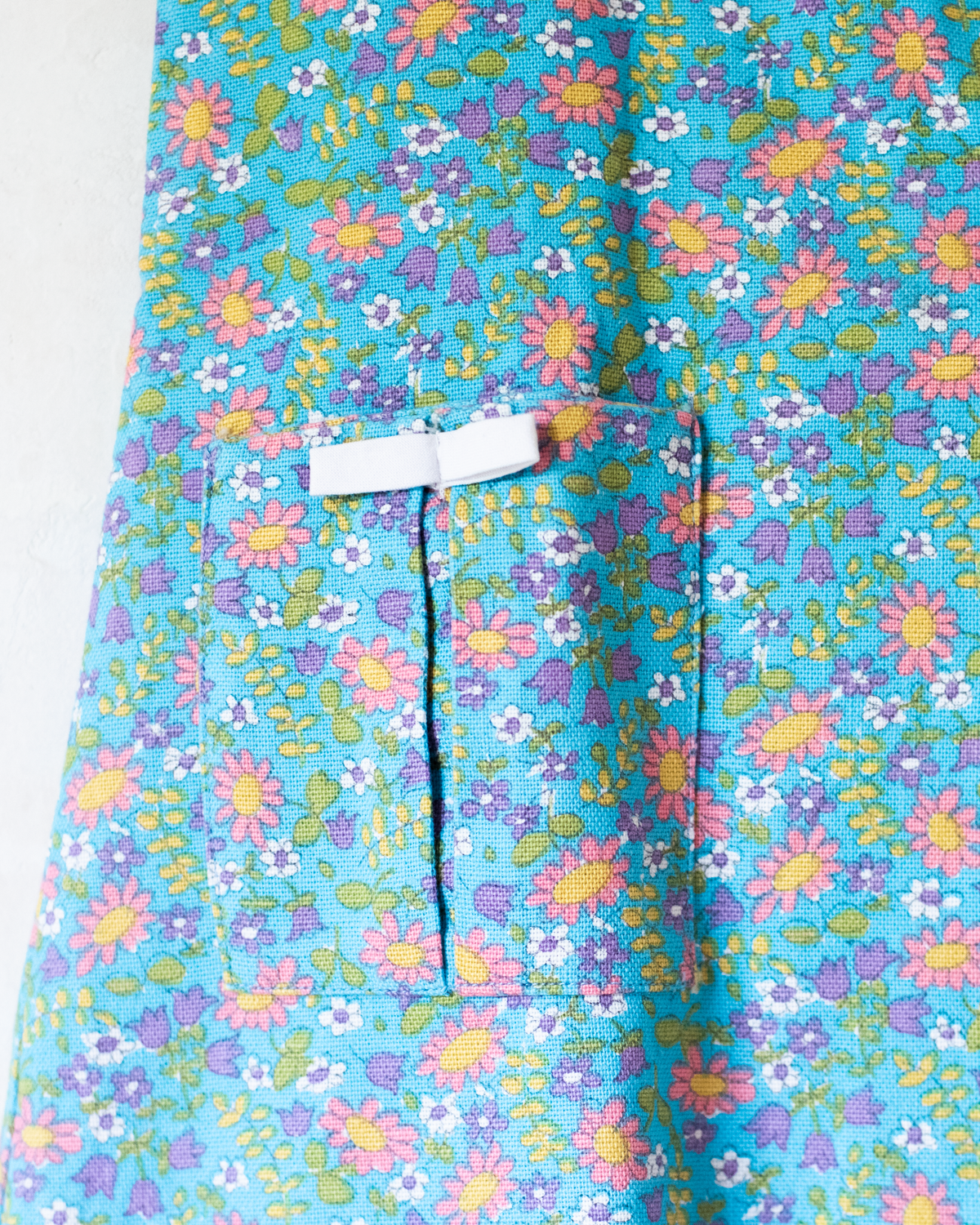 Sky-blue dress with flowers from the seventies | 18-24 months