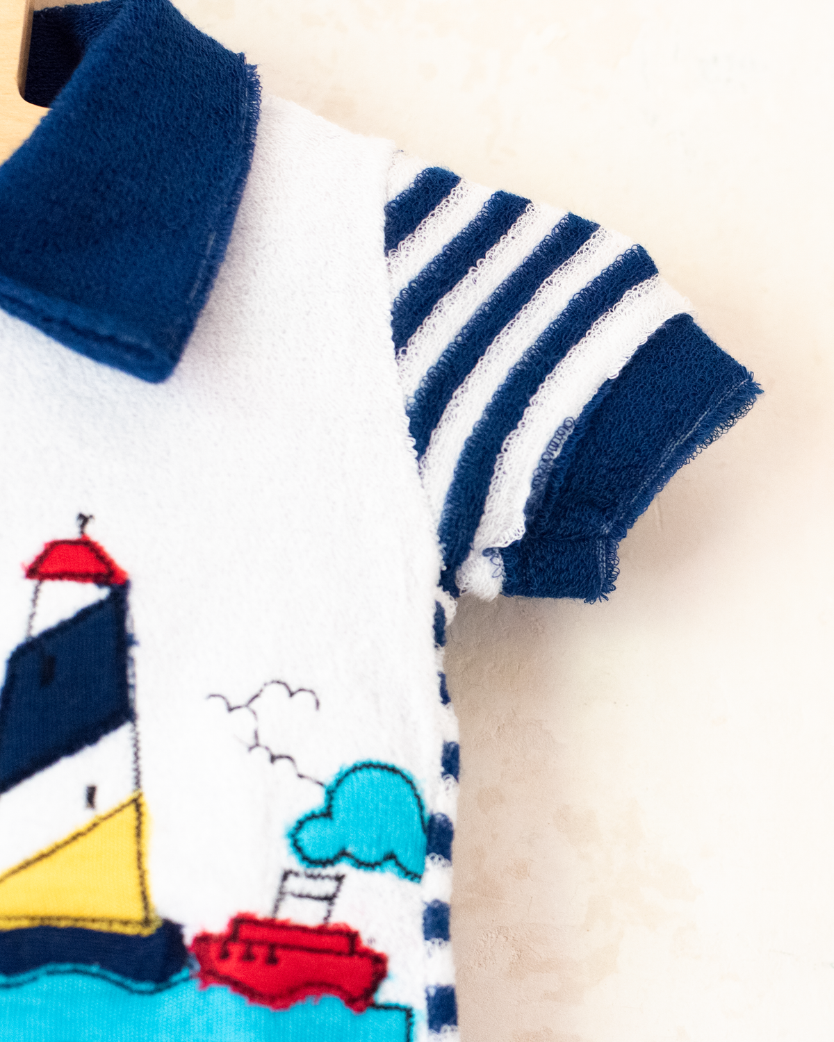 Red and white towelling overalls with stripes and a lighthouse | Spanish dead stock | 3-6 months