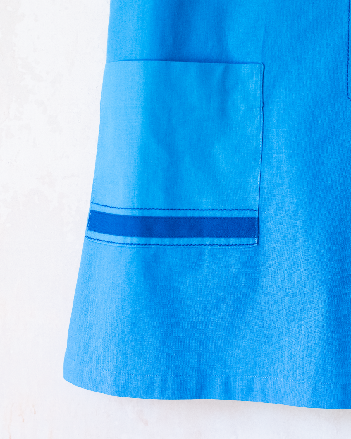 Blue cotton dress with embroidered flower | 6-7 years