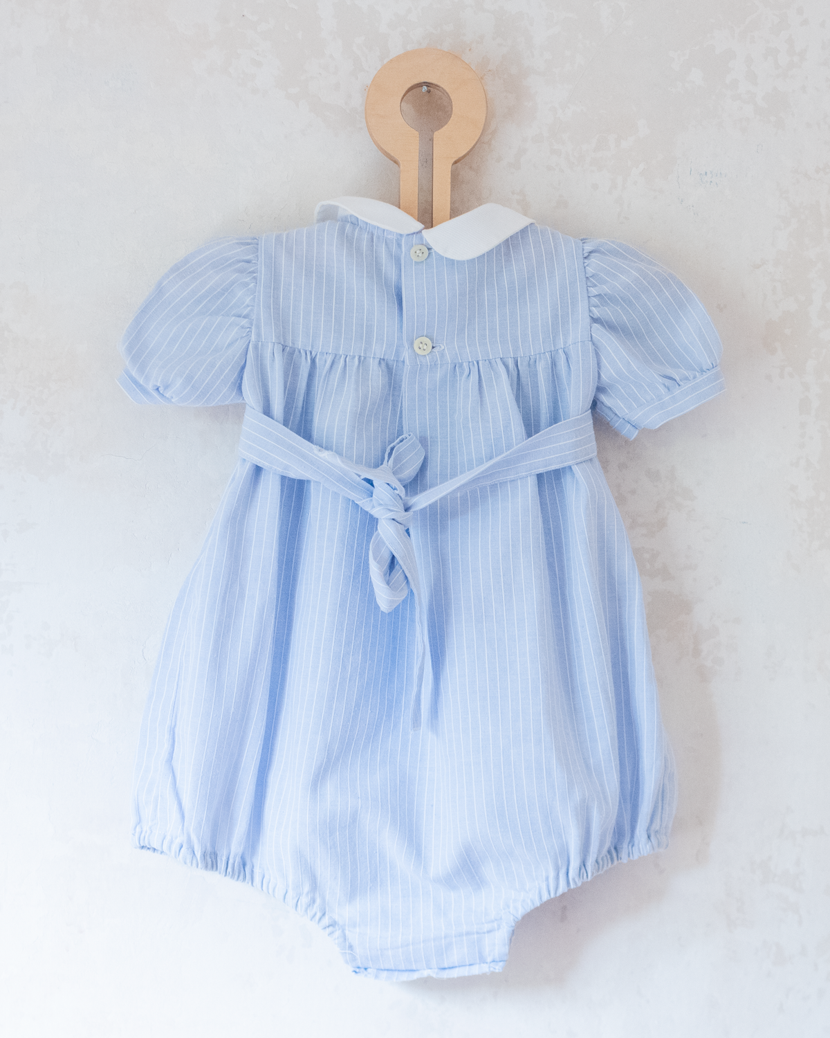 Light blue romper with delicate embroidery | 9-12 months