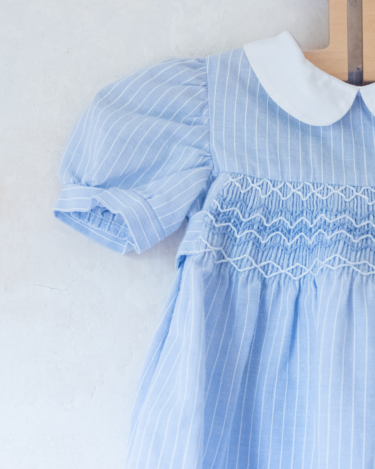 Light blue romper with delicate embroidery | 9-12 months