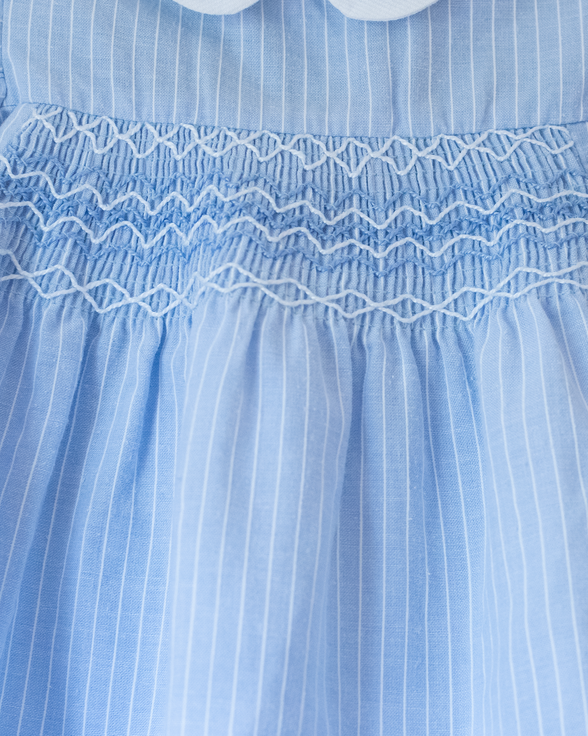Light blue romper with delicate embroidery | 9-12 months