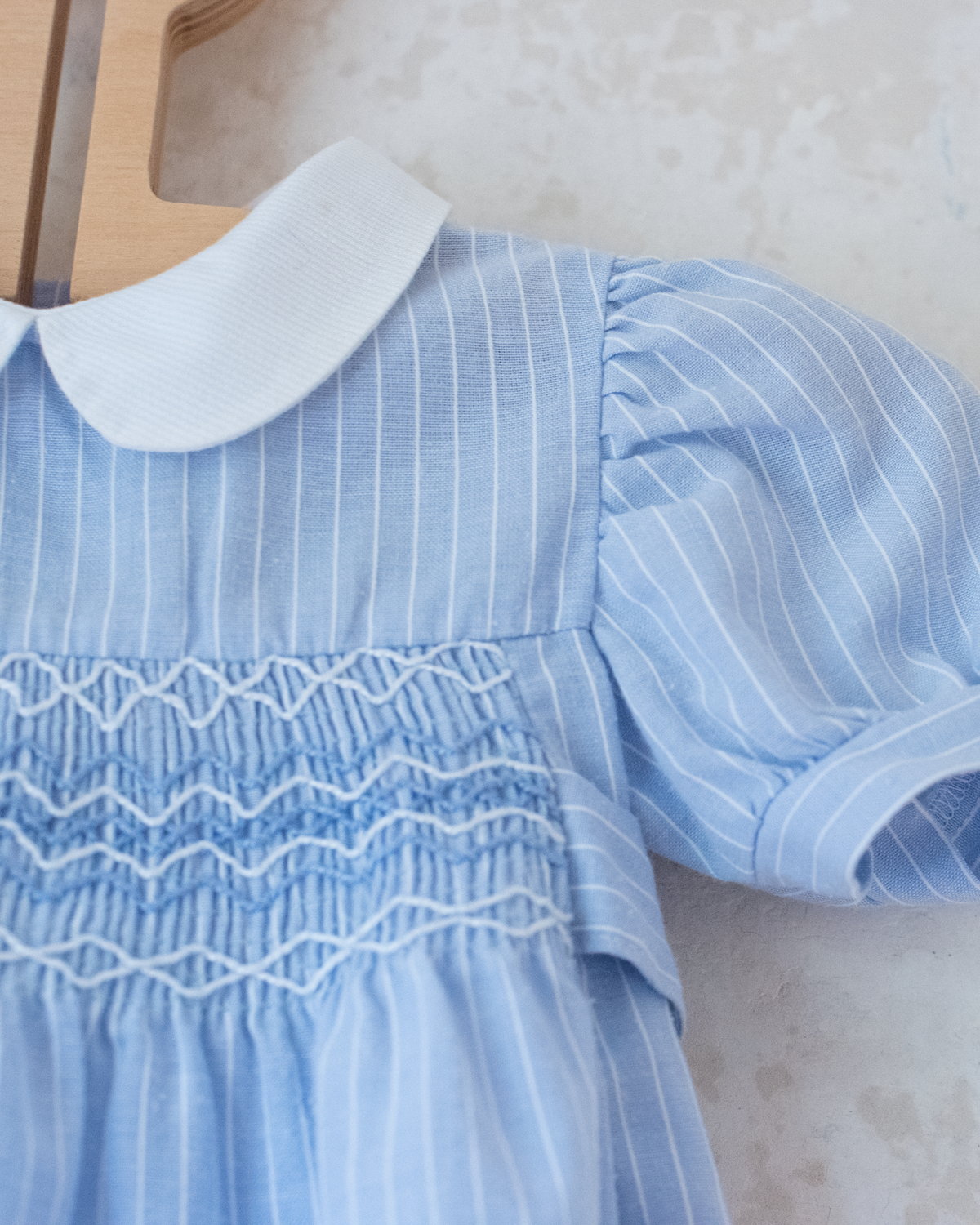 Light blue romper with delicate embroidery | 9-12 months