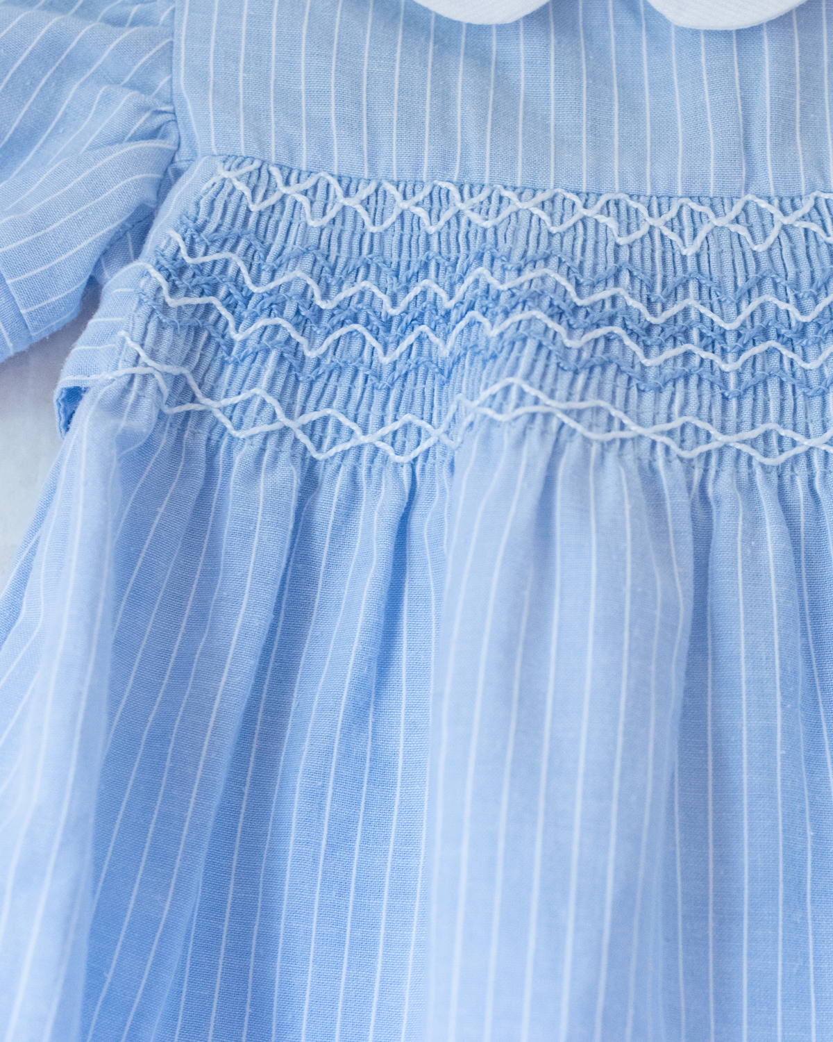 Light blue romper with delicate embroidery | 9-12 months
