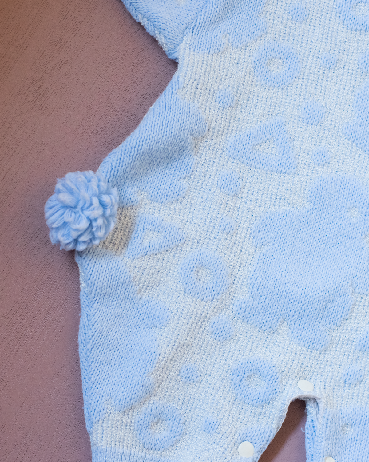 Knitted overalls with pompoms | 6-9 months