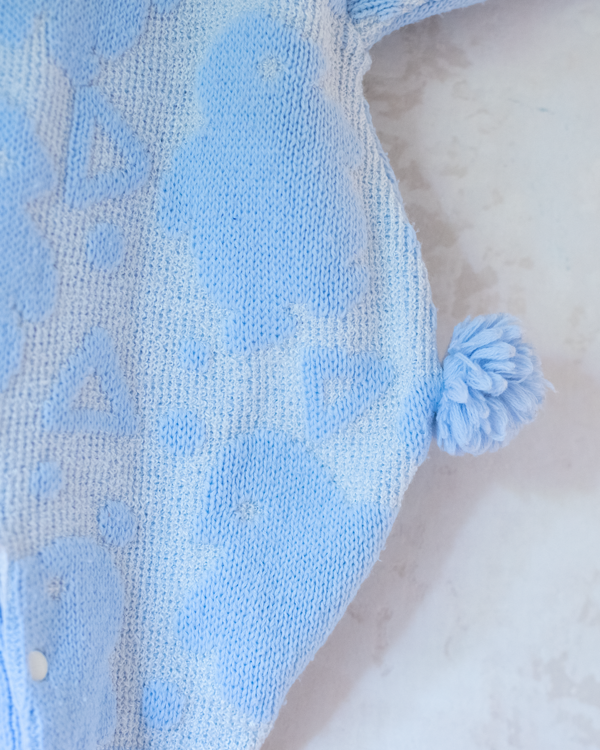 Knitted overalls with pompoms | 6-9 months