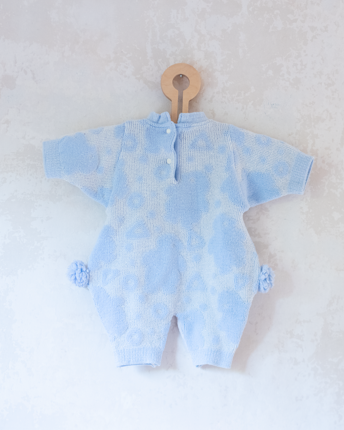 Knitted overalls with pompoms | 6-9 months
