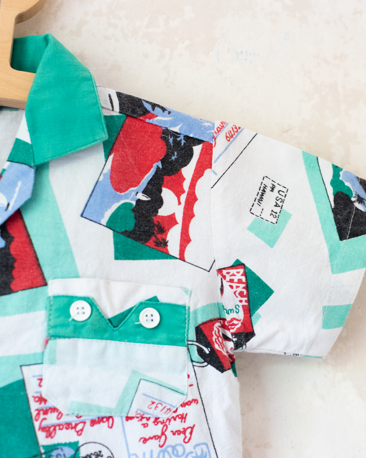 Button-down shirt with postcards and green collar | 3-4 years