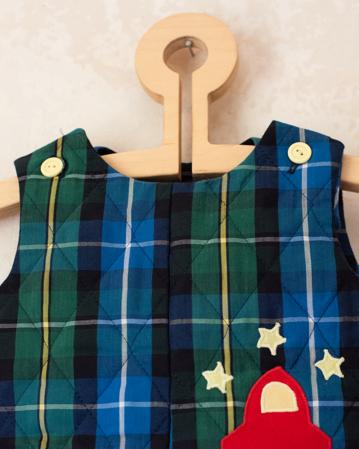 Green and blue plaid jumpsuit with spaceship embroidery | 9-12 months