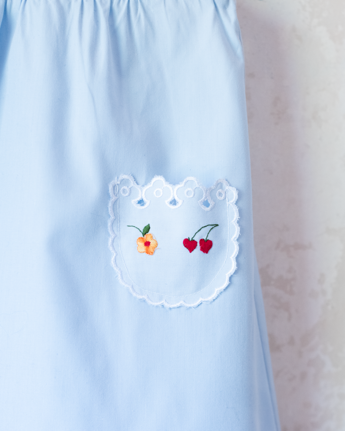 Light blue dress with embroidered flowers and fruit | 3-4 years