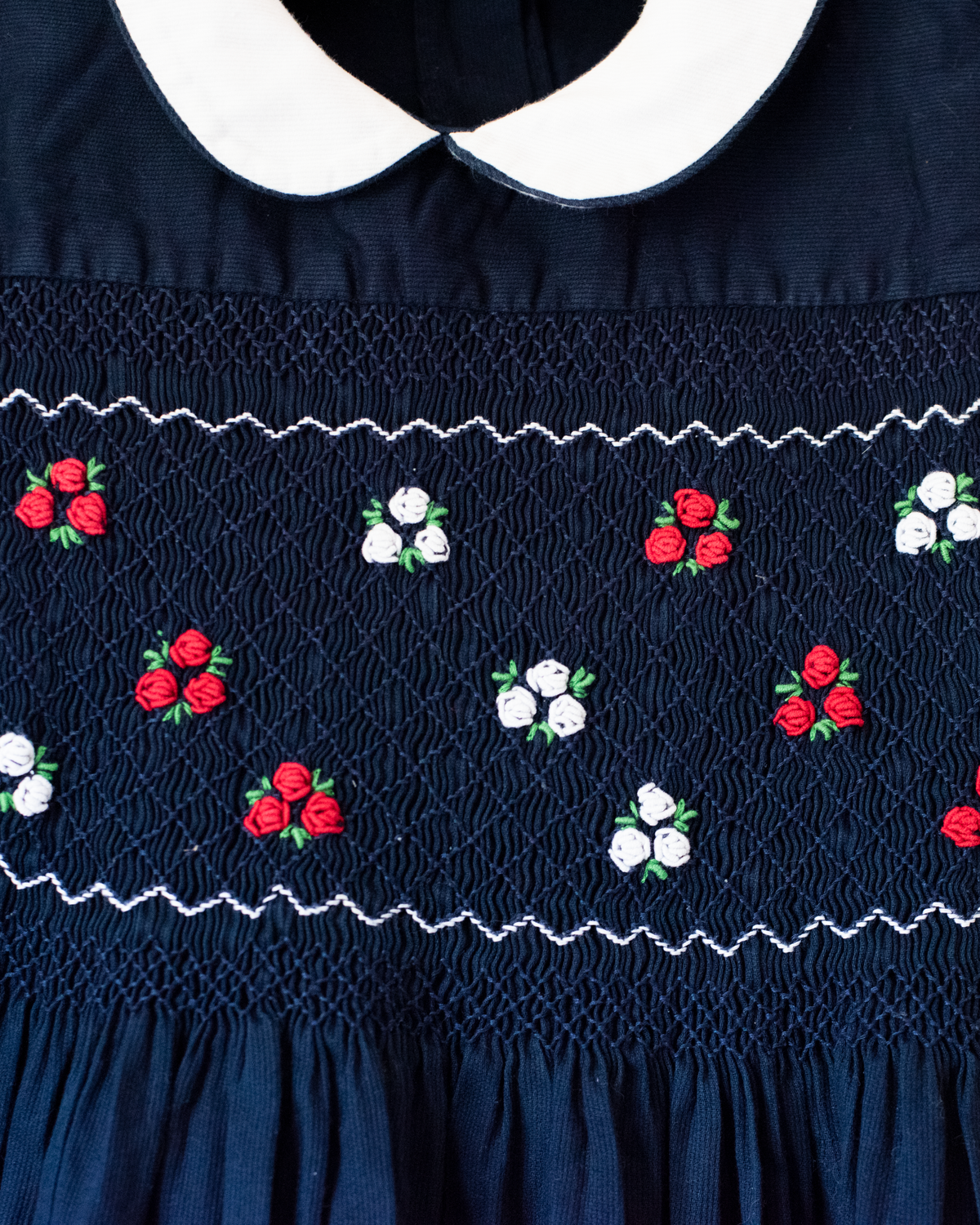 Blue dress with ruffles and floral embroidery | 7-8 years