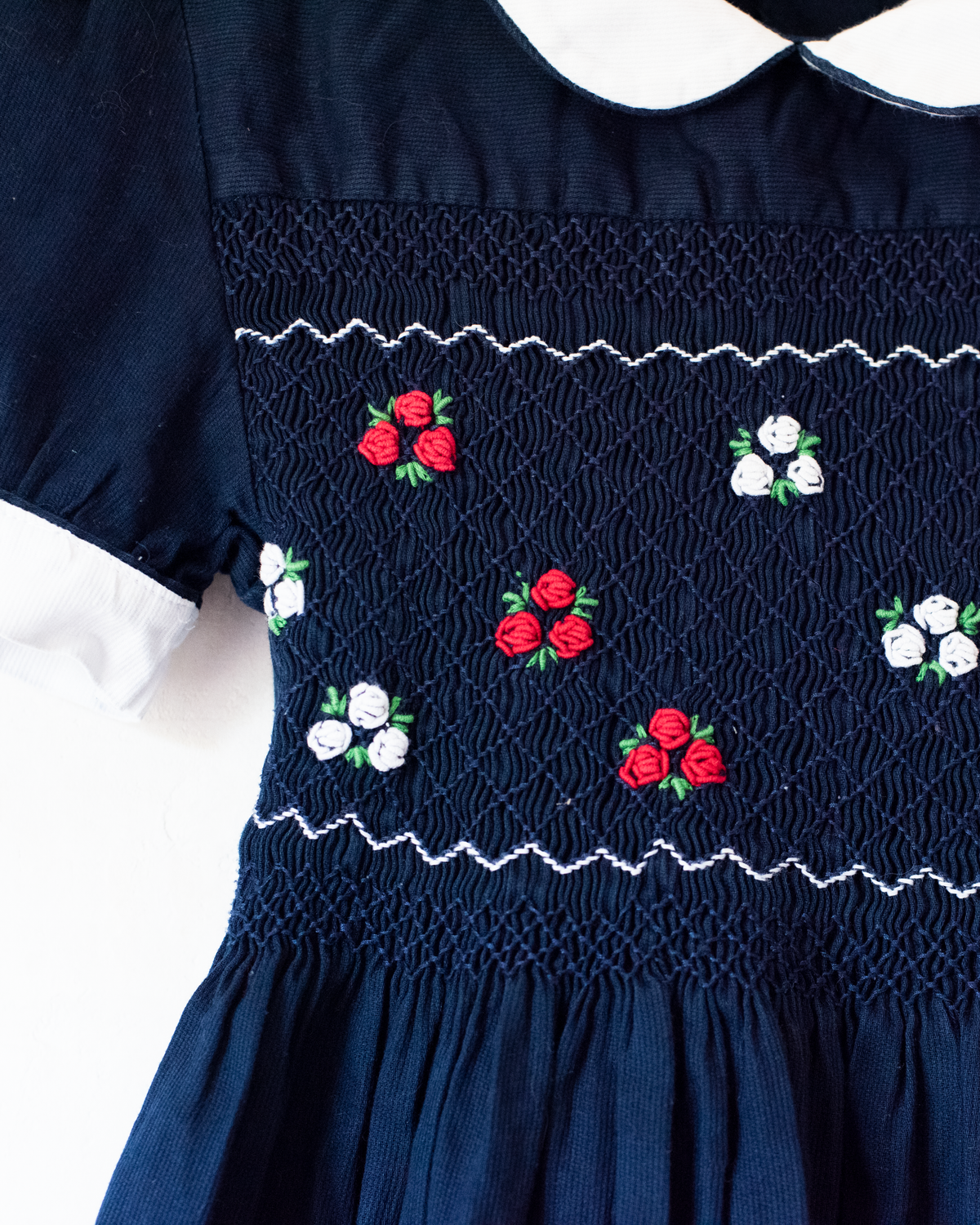 Blue dress with ruffles and floral embroidery | 7-8 years
