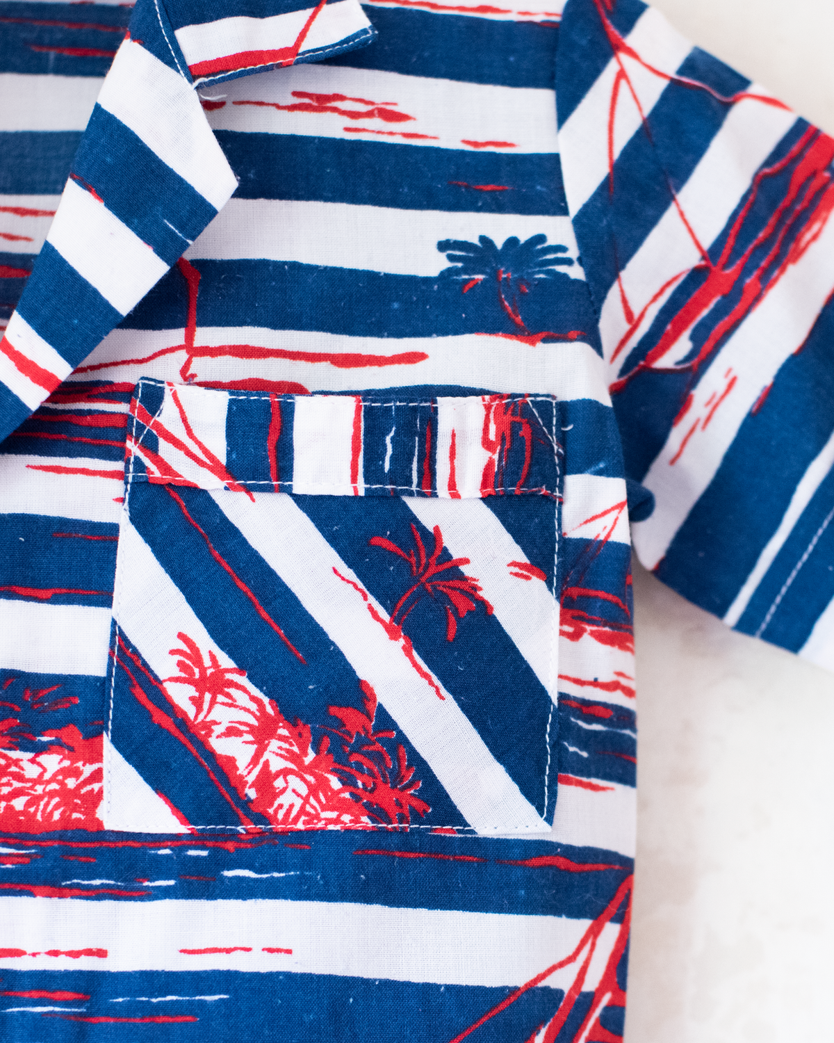 Button-down shirt with boat and palm tree stripes | 2-3 years