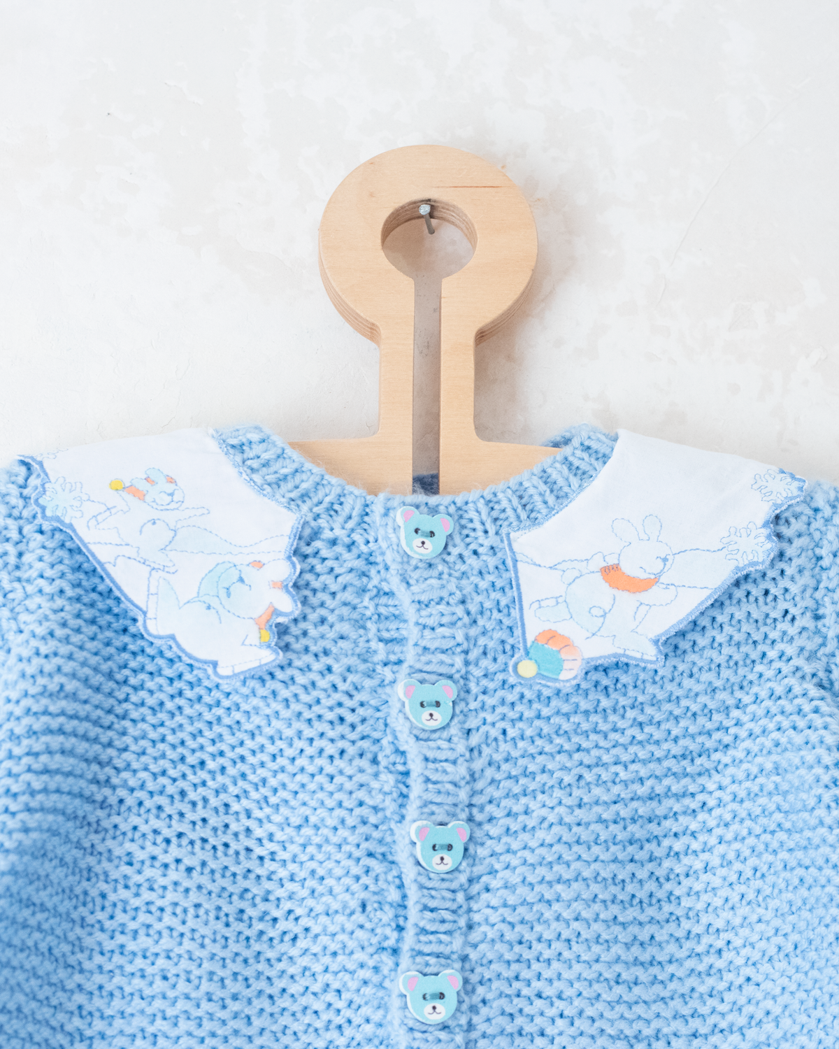 Light blue knit with collar and embroidered rabbits | 3-6 months 