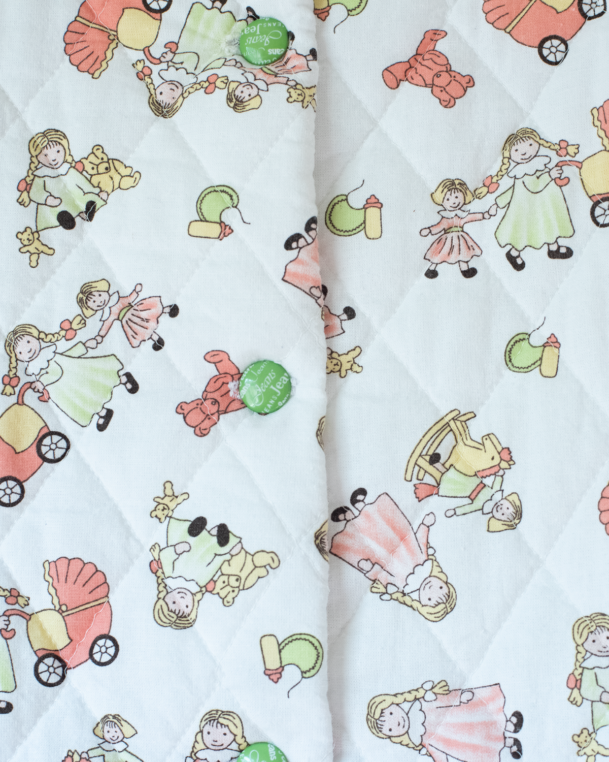 Quilted jacket with children's prints | 10-11 years