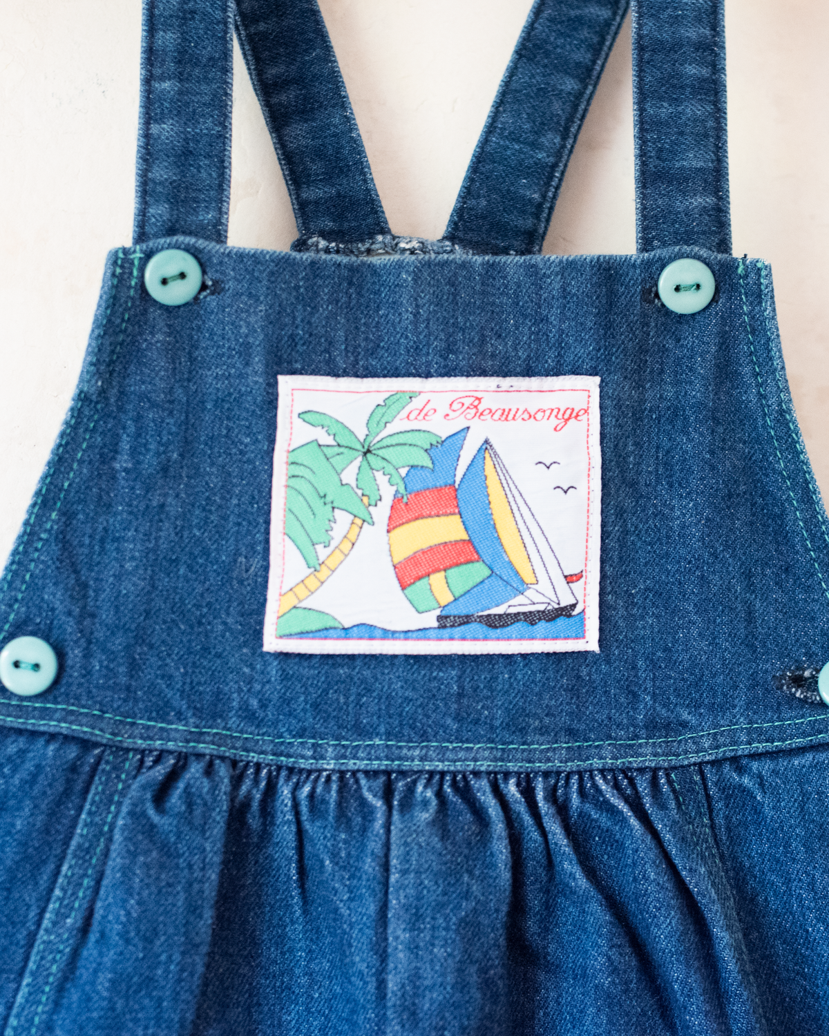 Denim overall with a colorful sailboat | 18-24 months