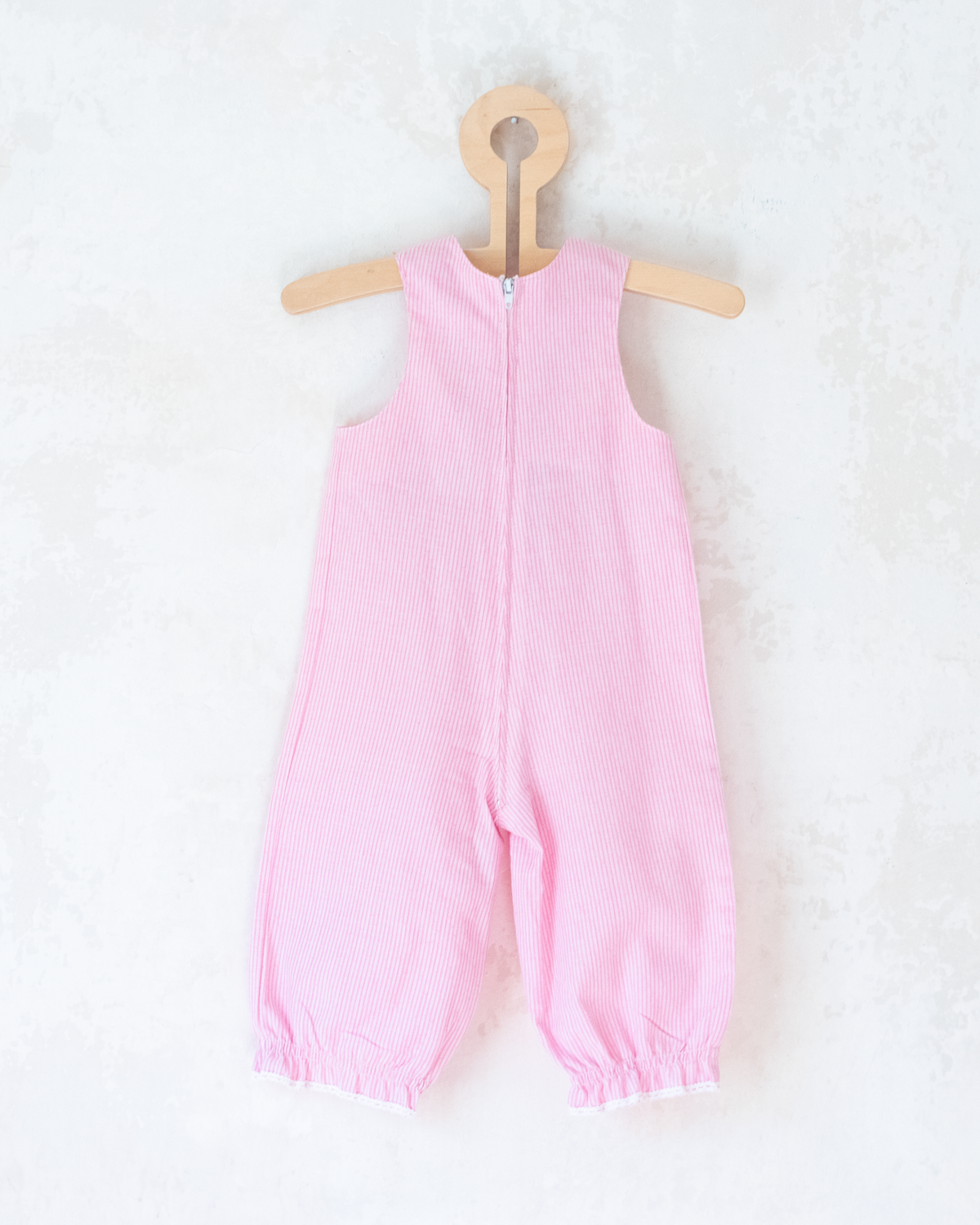 Pink striped overalls with embroidered sailboat | 6-9 months