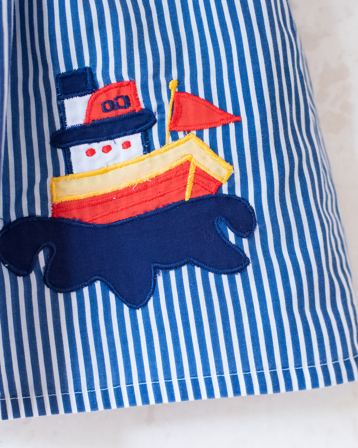 Sailor dress with stripes and a ship | 6-9 months