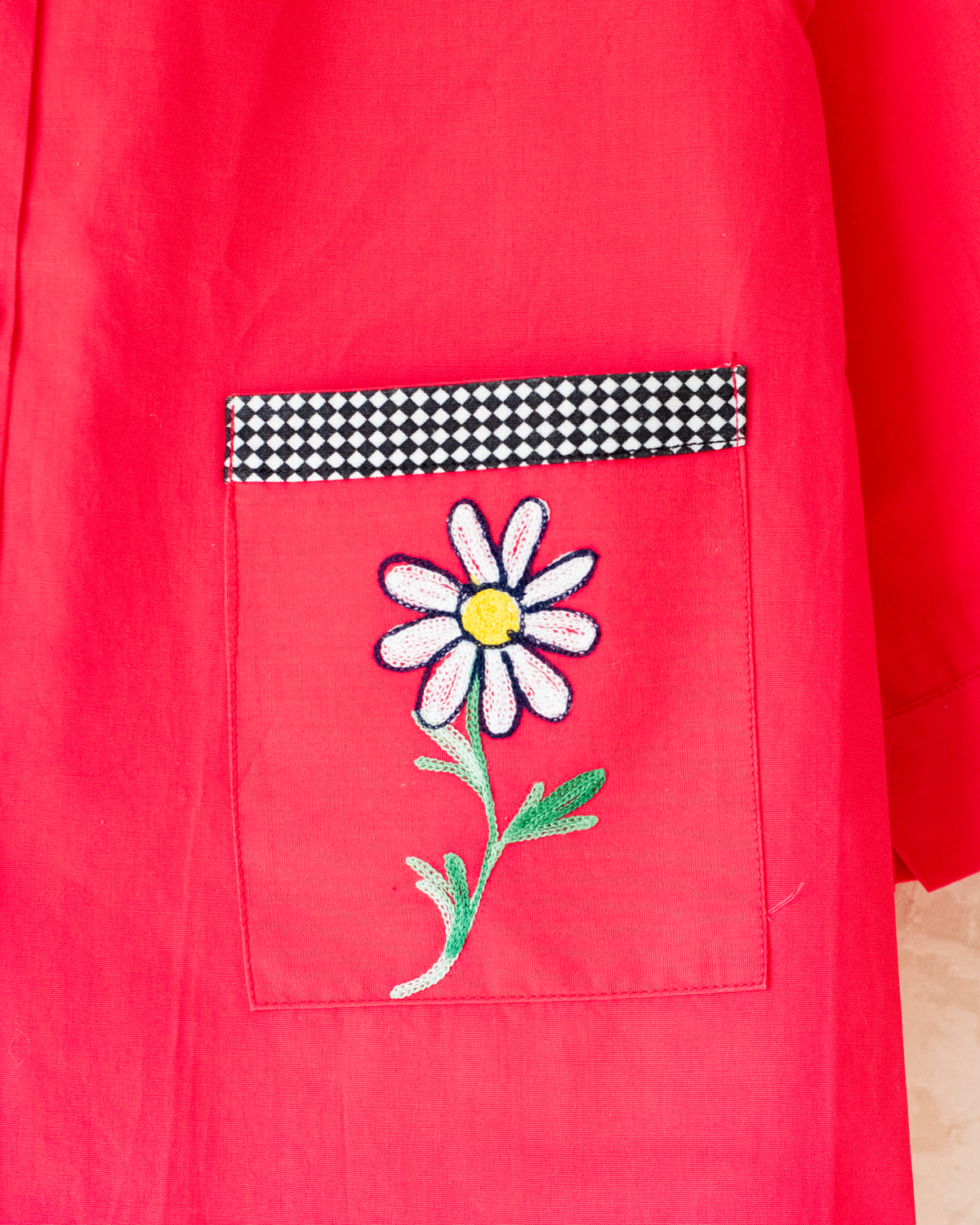 Long red shirt with daisy embroidery and plaid | 5-6 years
