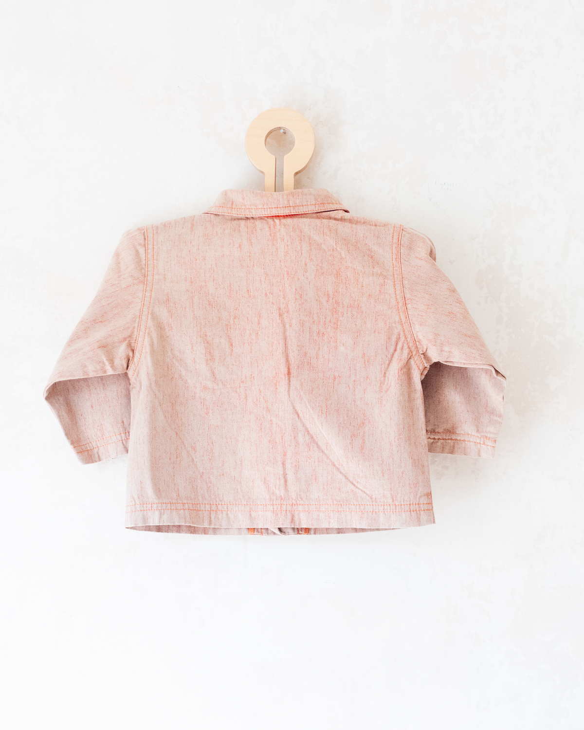 Brown thin jacket with the king at the bar and a basket of apples | 9-12 months