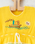 רומפר צהוב סרוג עם שמש וספינה | 3-6 חודשים