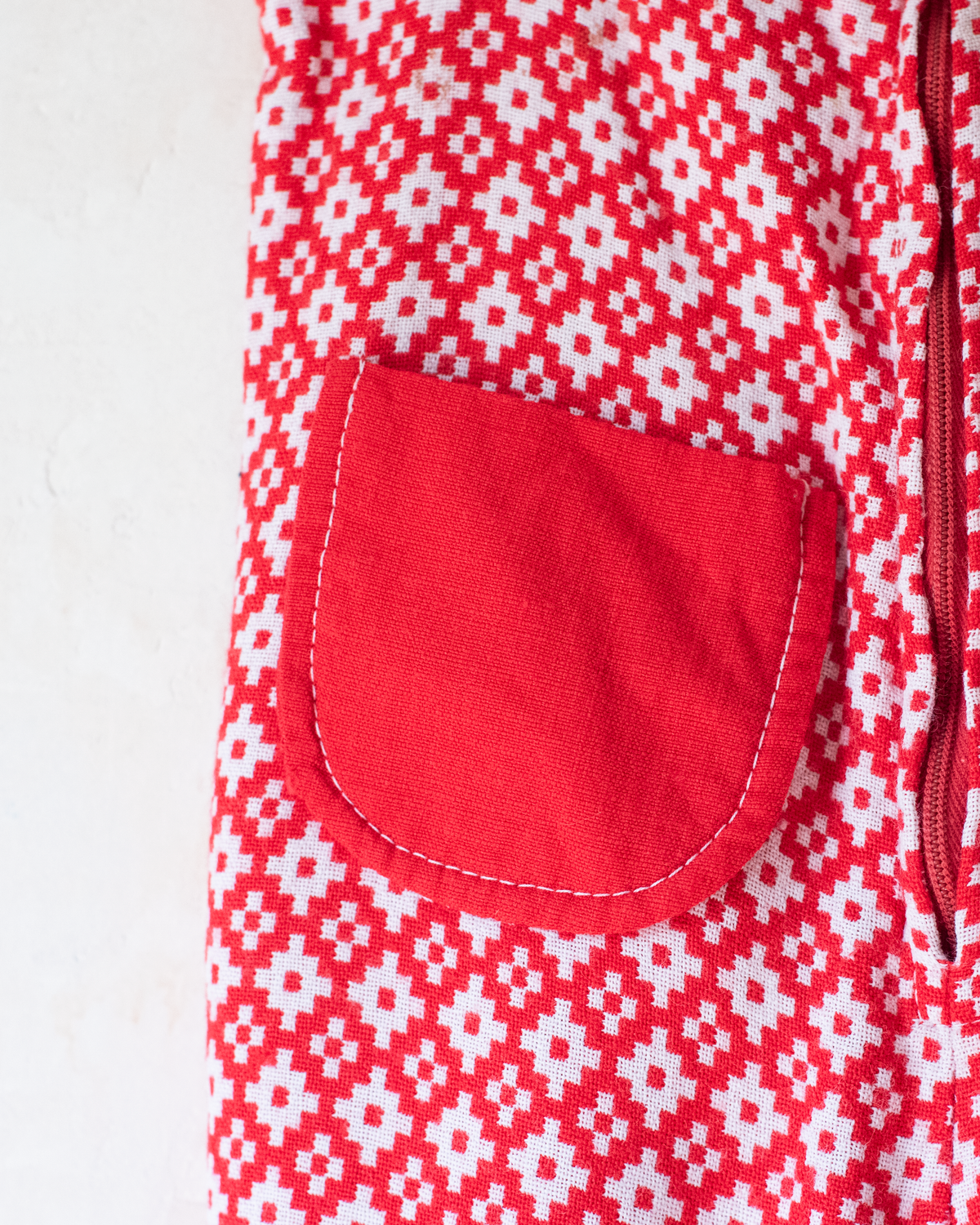 Red and white seventies-style overall | 2-3 years